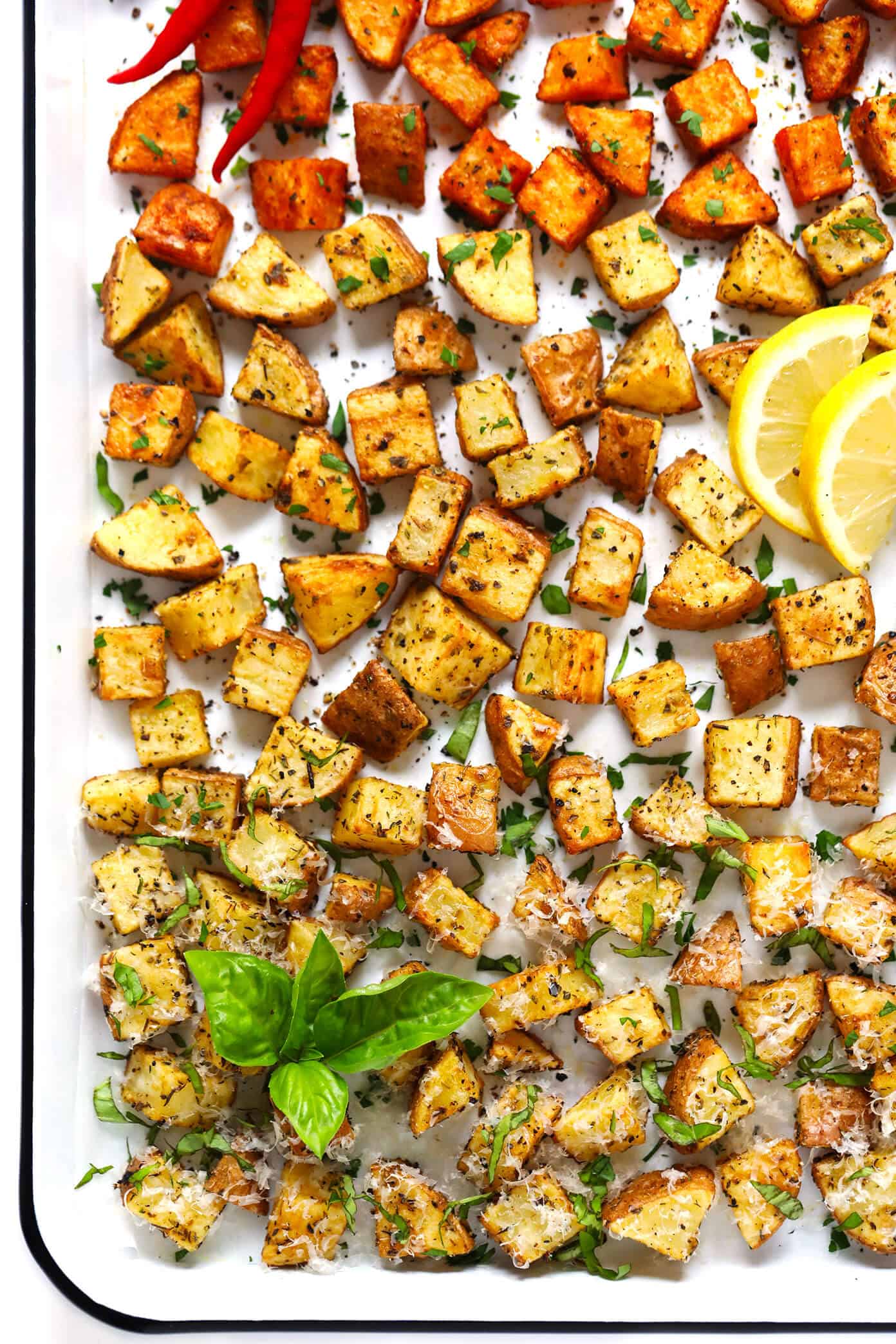 My favorite recipe for ultra crispy roasted potatoes -- made with 3 different seasonings (smoky, lemony, cheesy), naturally gluten-free, and SO delicious. They are perfect served as breakfast potatoes, or as a simple side dish for dinner or snacking. | Gimme Some Oven #roasted #potatoes #crispy #breakfast #side #gameday #snack #glutenfree #vegetarian #vegan Crispy Roasted Potatoes Recipe -- 3 Ways!