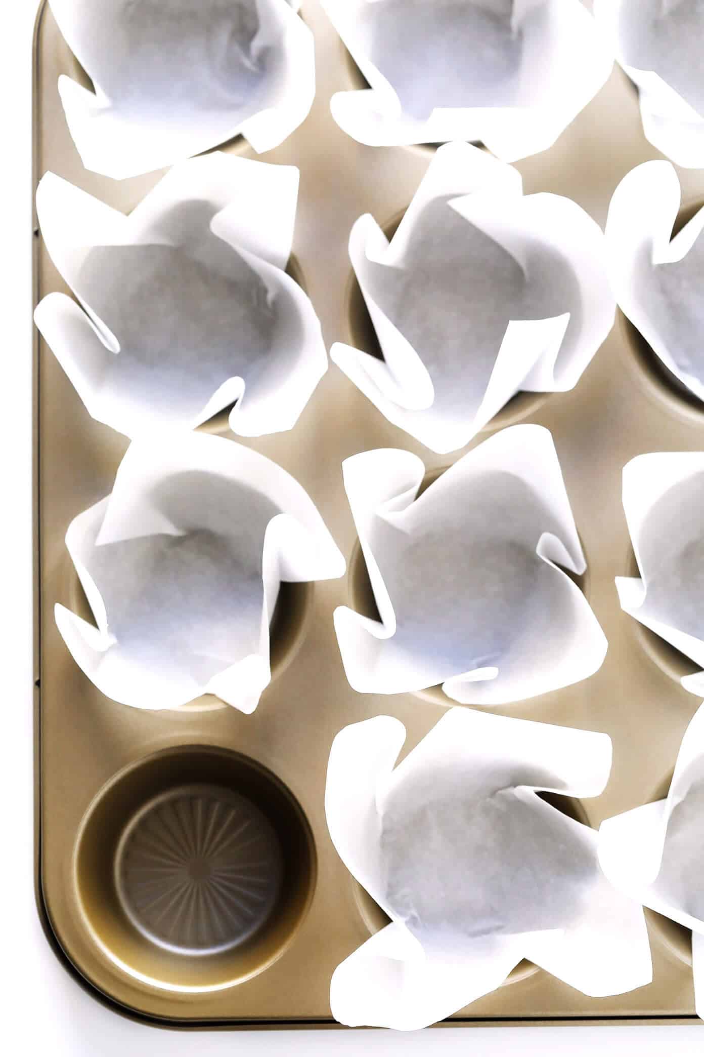 DIY Parchment Baking Liners -- these little tulip cups are perfect for cupcakes, muffins, or whatever else you feel like baking! | Gimme Some Oven #diy #baking #cupcakes #muffins #homemade #howto How To Make Cupcake Liners With Parchment Paper