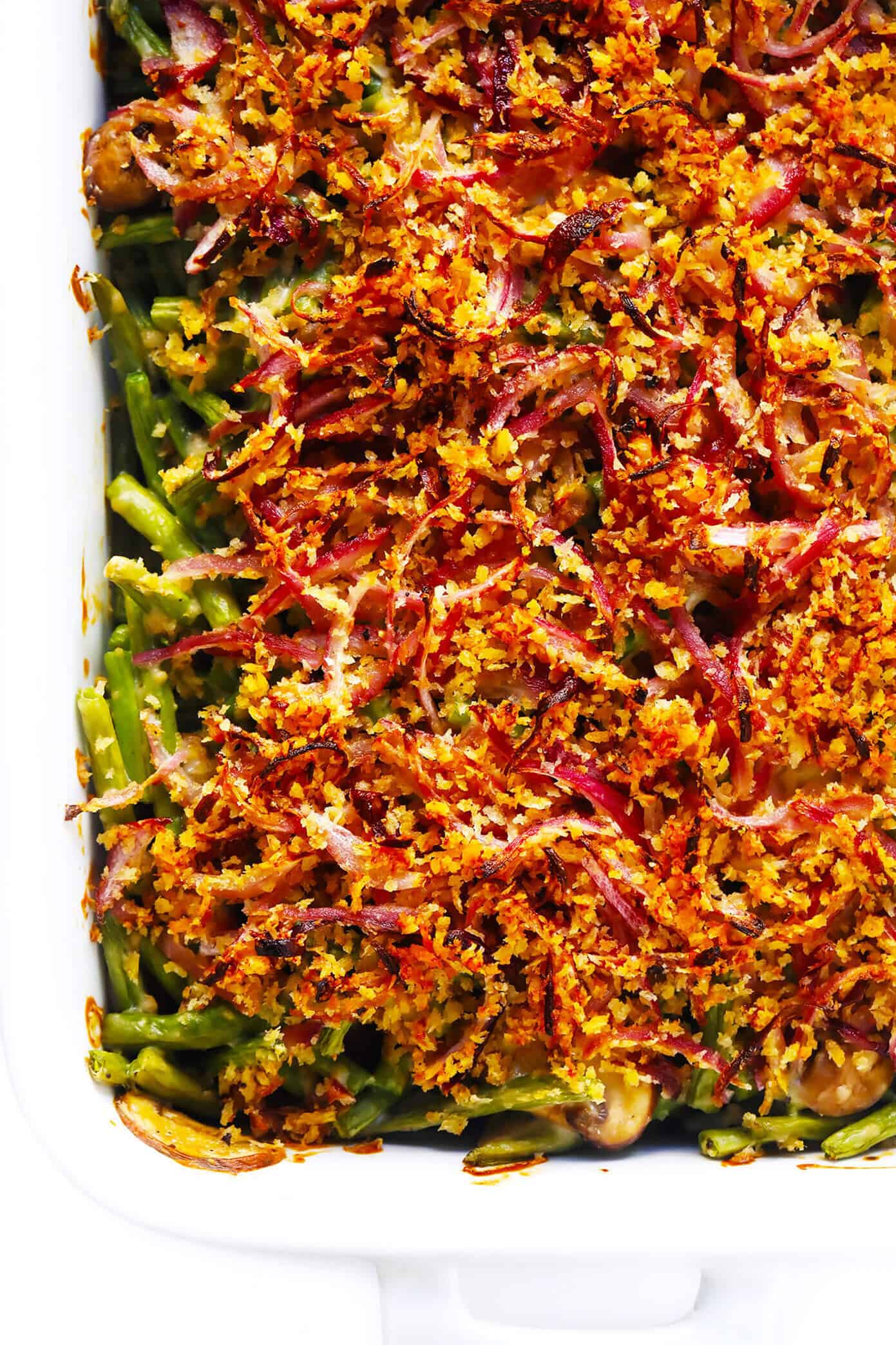 This BEST green bean casserole recipe -- made 100% from scratch with a crispy onion topping and creamy Parmesan mushroom green bean filling. So fresh and flavorful, and always the perfect side dish for Thanksgiving! | gimmesomeoven.com Easy Green Bean Casserole Recipe in Pan
