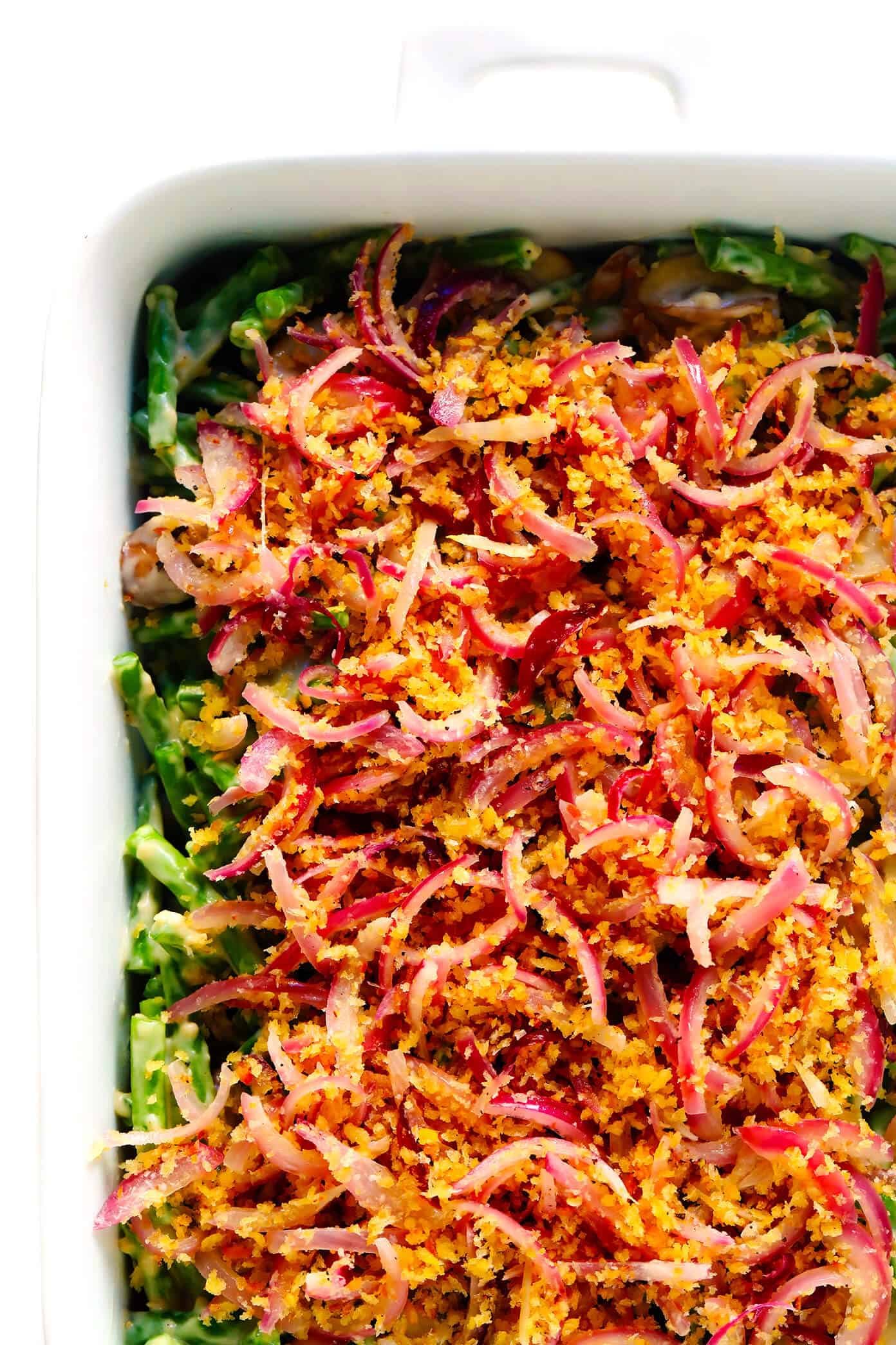 This BEST green bean casserole recipe -- made 100% from scratch with a crispy onion topping and creamy Parmesan mushroom green bean filling. So fresh and flavorful, and always the perfect side dish for Thanksgiving! | gimmesomeoven.com How To Make Green Bean Casserole from Scratch