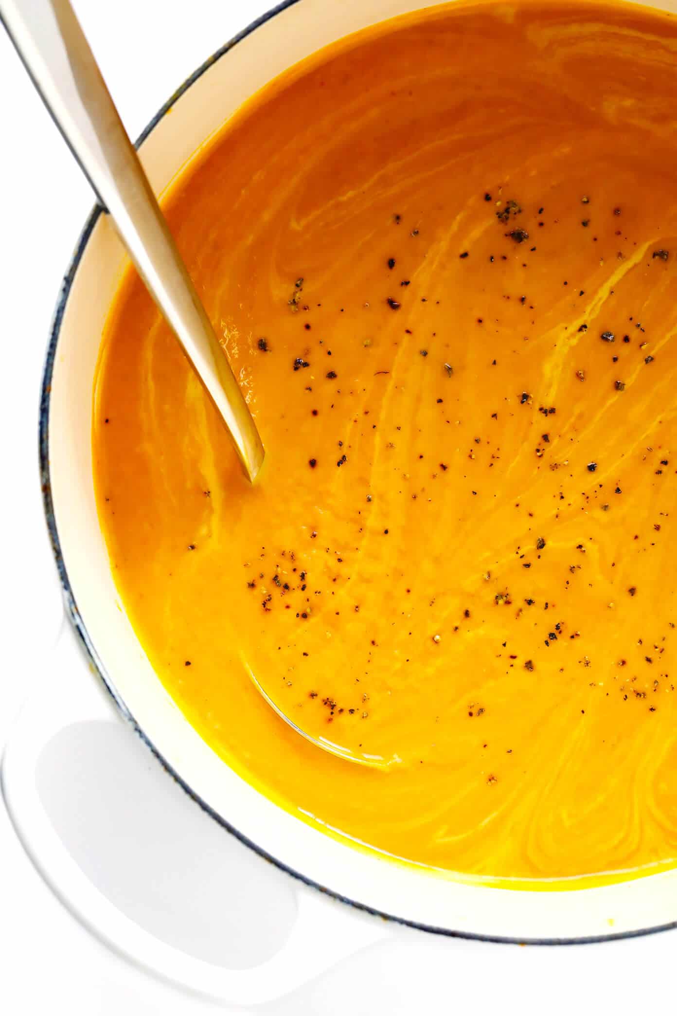 This 20-Minute Thai Curried Pumpkin Soup is the best!! It's quick and easy to make, naturally gluten-free and vegan, and made with the best warming curry flavors. Perfect for winter weeknight dinners, Thanksgiving, the holidays, you name it. | Gimme Some Oven #pumpkin #soup #healthy #vegan #glutenfree #vegetarian #thanksgiving #fall #winter #christmas #holiday Thai Curried Pumpkin Soup Recipe