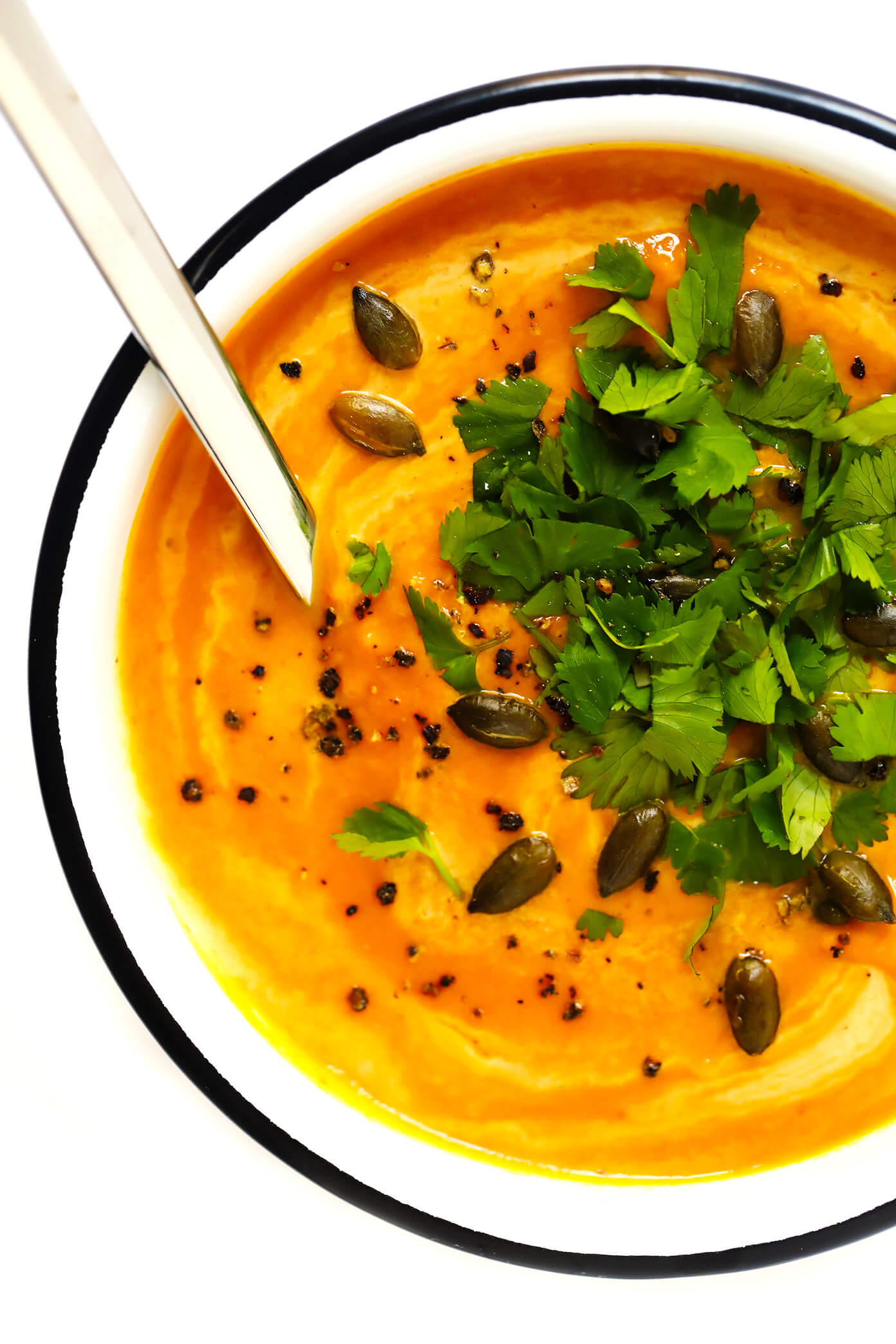 This 20-Minute Thai Curried Pumpkin Soup is the best!! It's quick and easy to make, naturally gluten-free and vegan, and made with the best warming curry flavors. Perfect for winter weeknight dinners, Thanksgiving, the holidays, you name it. | Gimme Some Oven #pumpkin #soup #healthy #vegan #glutenfree #vegetarian #thanksgiving #fall #winter #christmas #holiday How To Make Thai Curried Pumpkin Soup