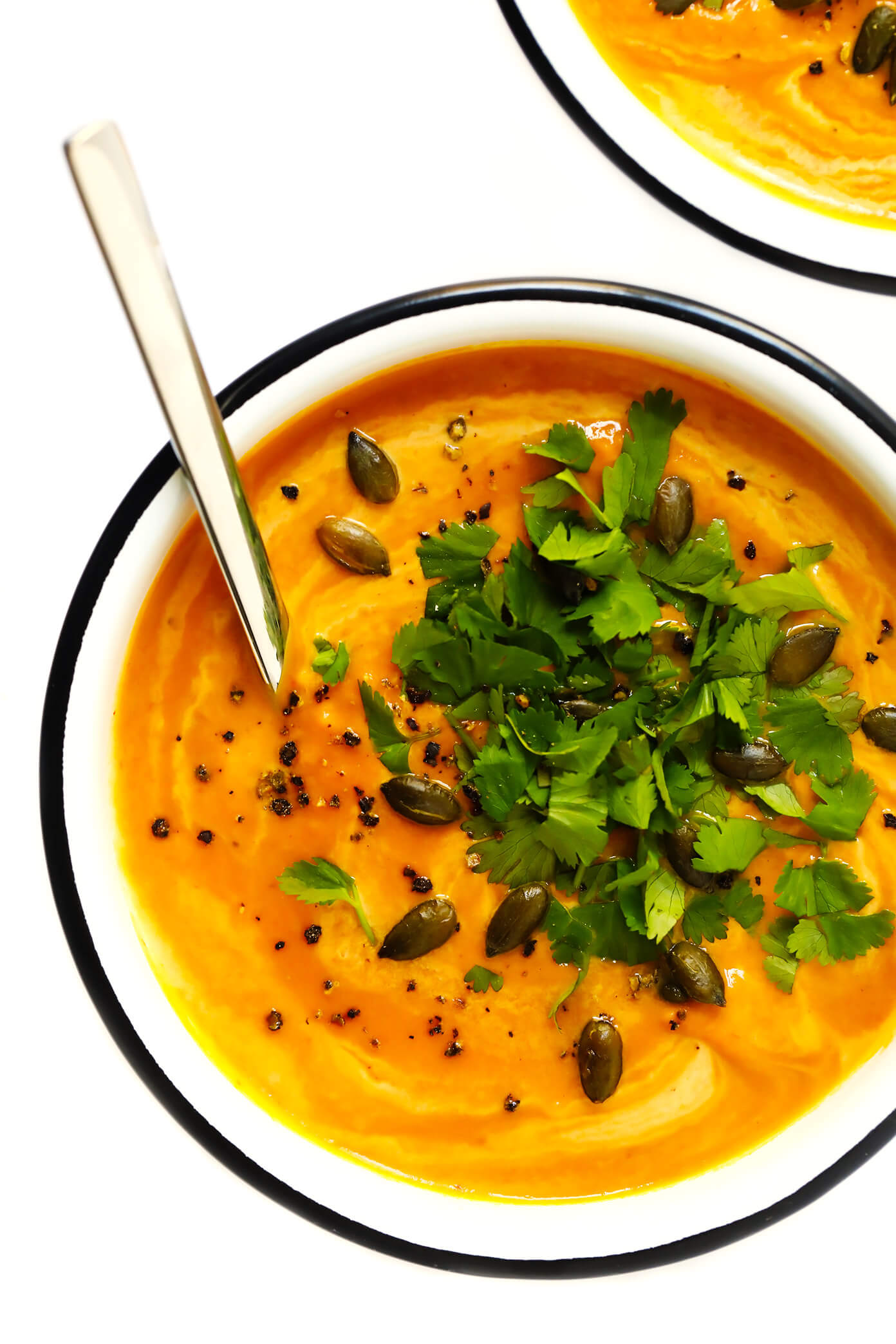This 20-Minute Thai Curried Pumpkin Soup is the best!! It's quick and easy to make, naturally gluten-free and vegan, and made with the best warming curry flavors. Perfect for winter weeknight dinners, Thanksgiving, the holidays, you name it. | Gimme Some Oven #pumpkin #soup #healthy #vegan #glutenfree #vegetarian #thanksgiving #fall #winter #christmas #holiday Thai Curried Pumpkin Soup Recipe