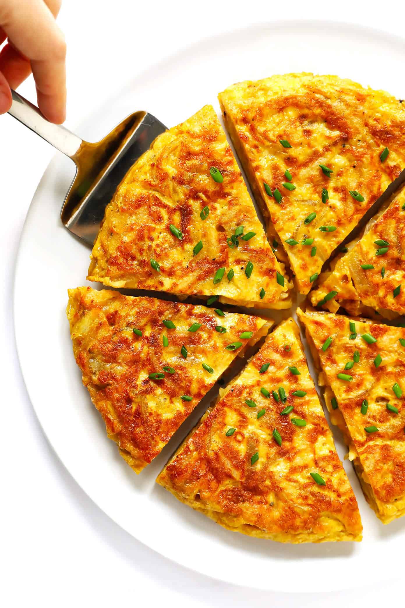 This 15-Minute Shortcut Spanish Omelette (Tortilla Española) is super quick and easy to make, thanks to a secret ingredient -- KETTLE CHIPS! All you need are four easy ingredients to make this delicious egg and potato omelette. | Gimme Some Oven #omelette #spanish #egg #potato #spain #tortilla Potato Chip Spanish Tortilla Recipe