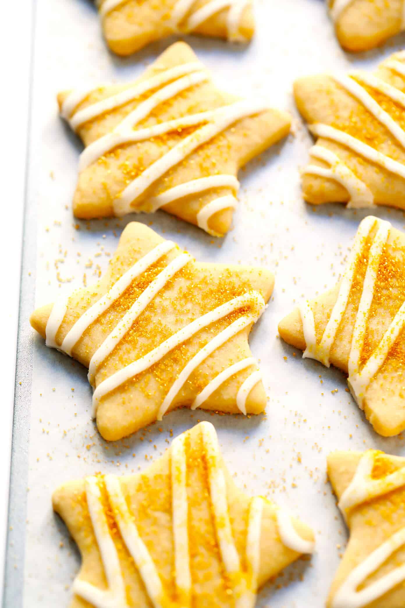 My favorite Brown Sugar Cookie recipe! It's easy to make, holds its shape well with all of your favorite cookie cutters, and always so delicious. Perfect for the holidays or anytime you're craving sugar cookies! | Gimme Some Oven #sugarcookies #cookie #baking #dessert #christmas #holiday #icing How To Make Sugar Cookies