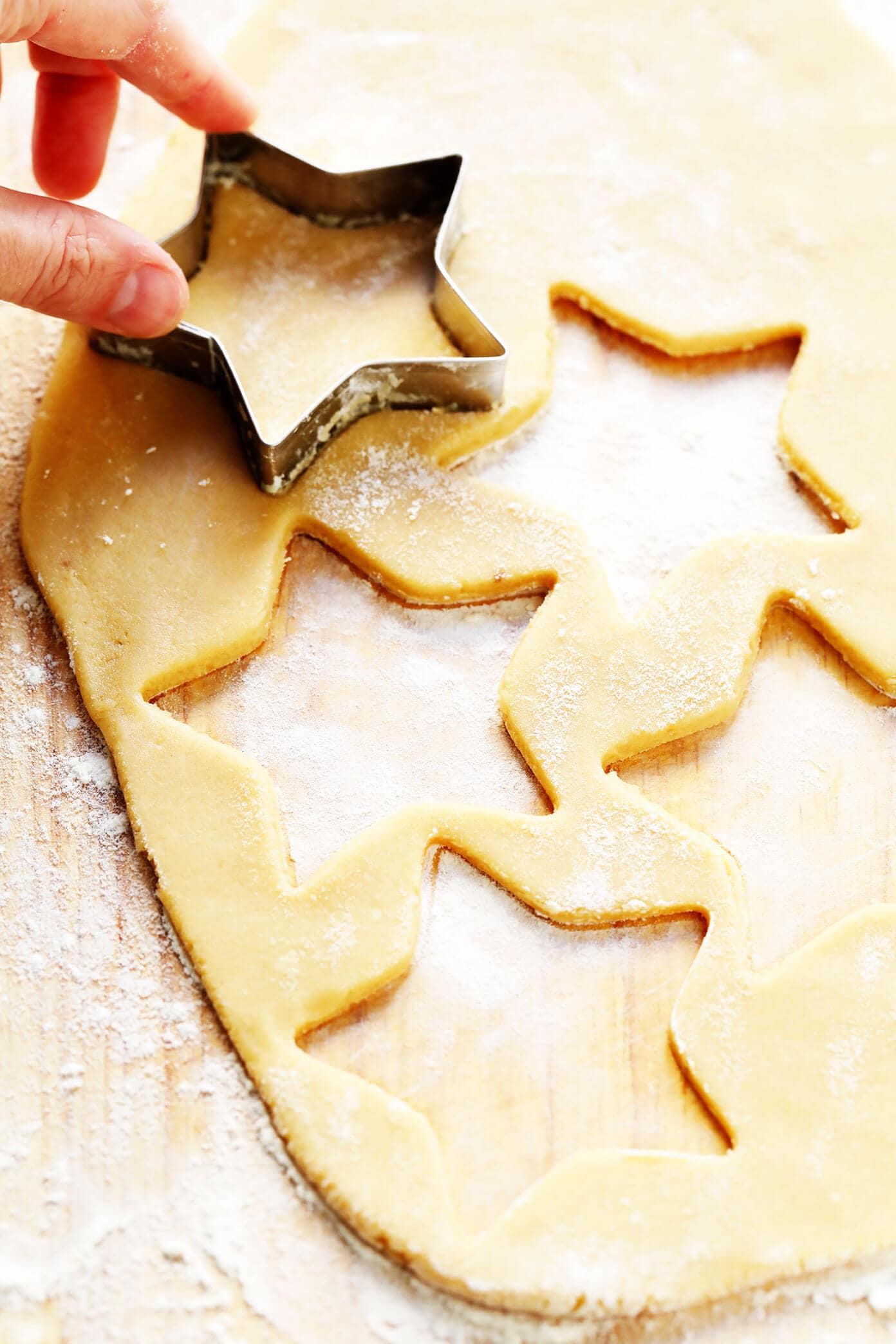 My favorite Brown Sugar Cookie recipe! It's easy to make, holds its shape well with all of your favorite cookie cutters, and always so delicious. Perfect for the holidays or anytime you're craving sugar cookies! | Gimme Some Oven #sugarcookies #cookie #baking #dessert #christmas #holiday #icing Cut-Out Brown Sugar Cookies