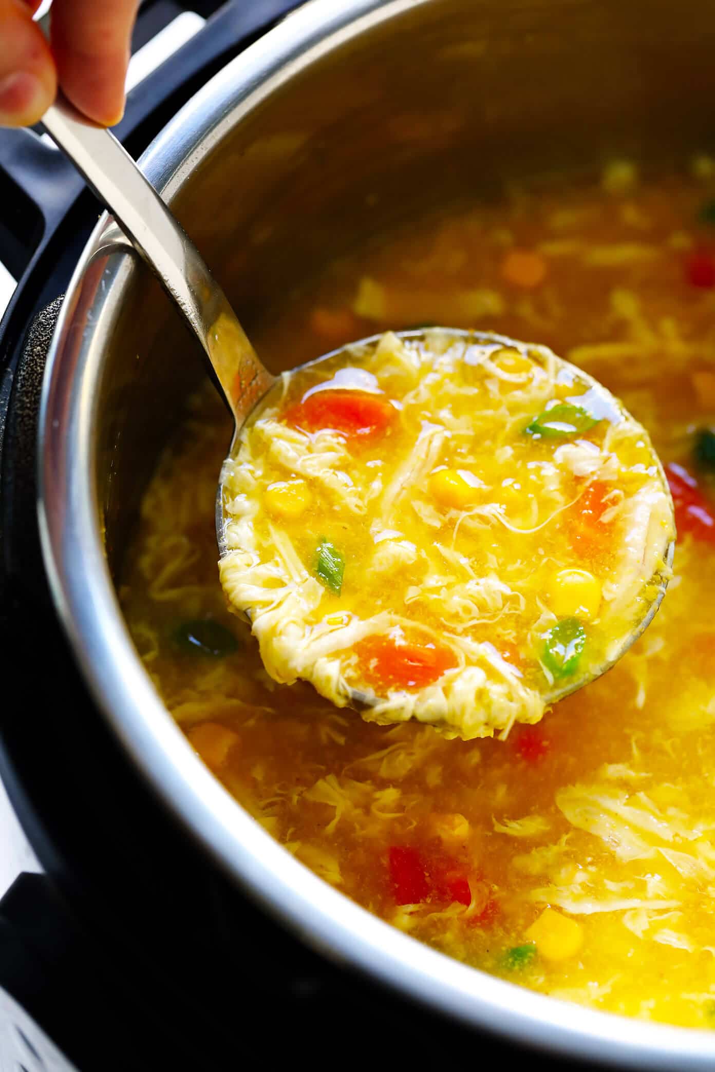 LOVE this cozy Chicken and Sweet Corn Soup recipe. It's basically an egg drop soup that's loaded up with chicken, corn and veggies. It's easy to make on the stovetop or in the Instant Pot. And it's sooo comforting and delicious. | Gimme Some Oven #eggdropsoup #chicken #soup #dinner #instantpot #healthy #glutenfree How To Make Chicken and Sweet Corn Soup in the Instant Pot (Pressure Cooker)