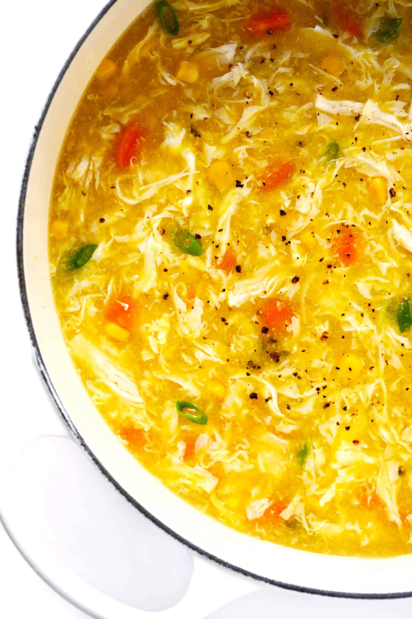 LOVE this cozy Chicken and Sweet Corn Soup recipe. It's basically an egg drop soup that's loaded up with chicken, corn and veggies. It's easy to make on the stovetop or in the Instant Pot. And it's sooo comforting and delicious. | Gimme Some Oven #eggdropsoup #chicken #soup #dinner #instantpot #healthy #glutenfree Chicken and Sweet Corn Soup Recipe