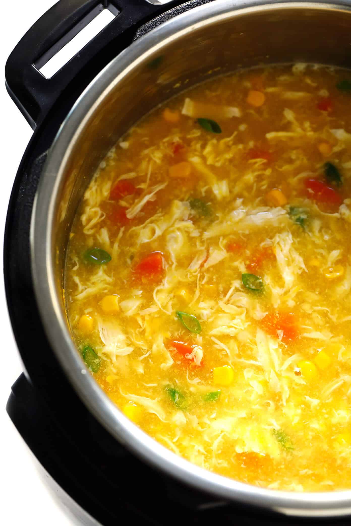 LOVE this cozy Chicken and Sweet Corn Soup recipe. It's basically an egg drop soup that's loaded up with chicken, corn and veggies. It's easy to make on the stovetop or in the Instant Pot. And it's sooo comforting and delicious. | Gimme Some Oven #eggdropsoup #chicken #soup #dinner #instantpot #healthy #glutenfree Instant Pot Chicken and Sweet Corn Soup Recipe