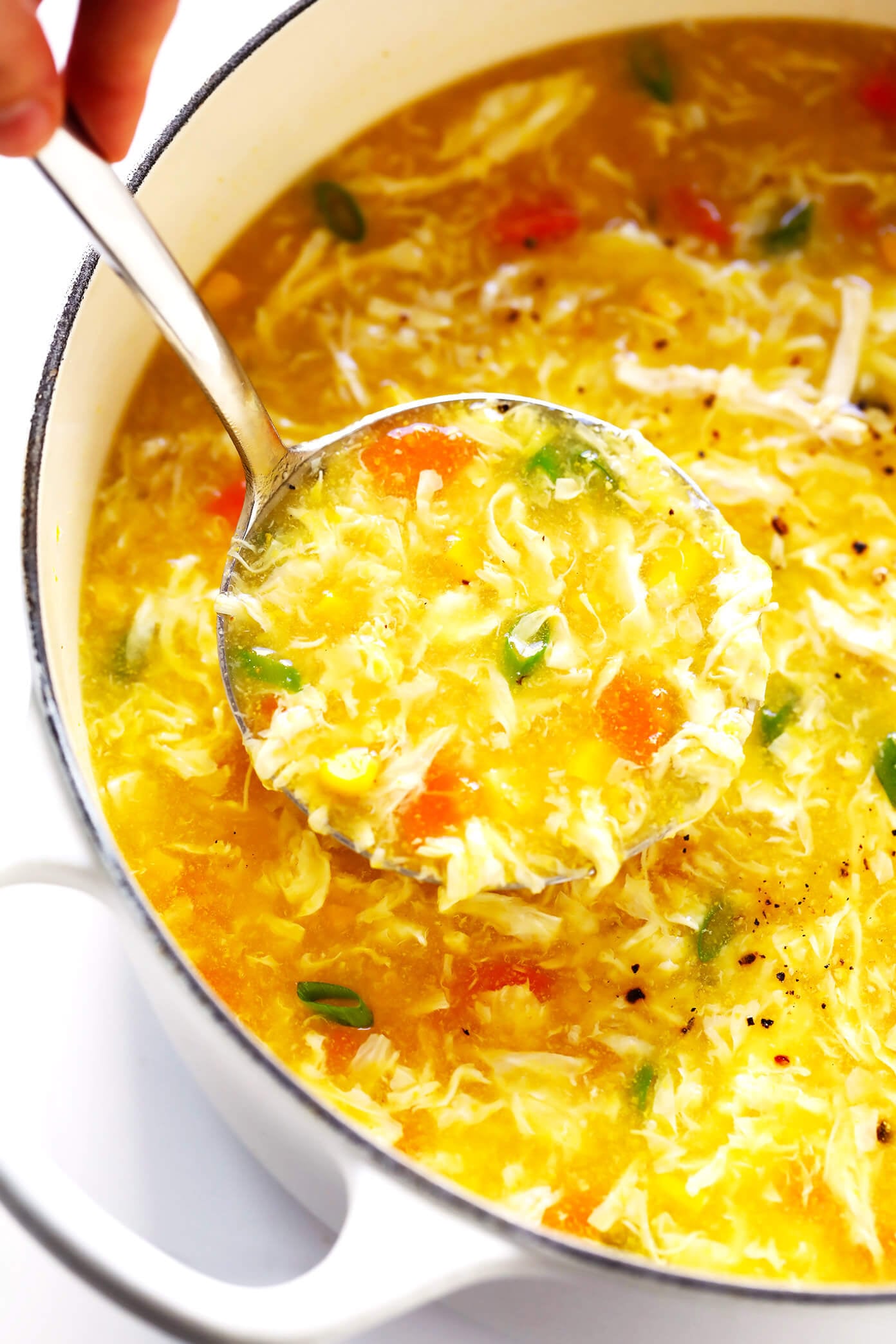 LOVE this cozy Chicken and Sweet Corn Soup recipe. It's basically an egg drop soup that's loaded up with chicken, corn and veggies. It's easy to make on the stovetop or in the Instant Pot. And it's sooo comforting and delicious. | Gimme Some Oven #eggdropsoup #chicken #soup #dinner #instantpot #healthy #glutenfree Chicken and Sweet Corn Soup
