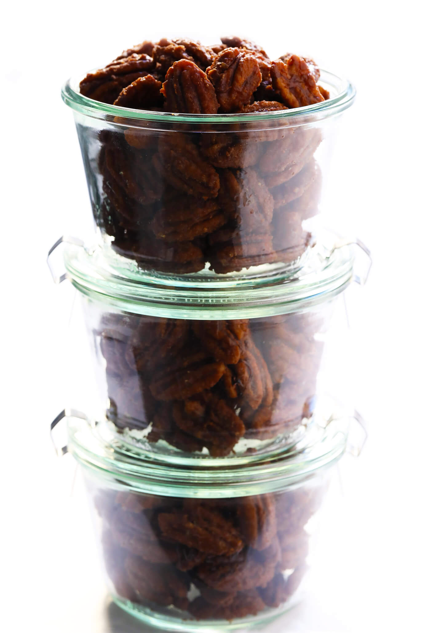 This 5-Ingredient Maple Candied Pecans recipe is irresistibly delicious! It's naturally sweetened with maple syrup, easy to make on the stovetop, and perfect for snacking, sprinkling on salads, or giving away as homemade gifts. | Gimme Some Oven #candied #pecans #glutenfree #vegan #maple #dessert #homemade #gift Maple Syrup Candied Pecans