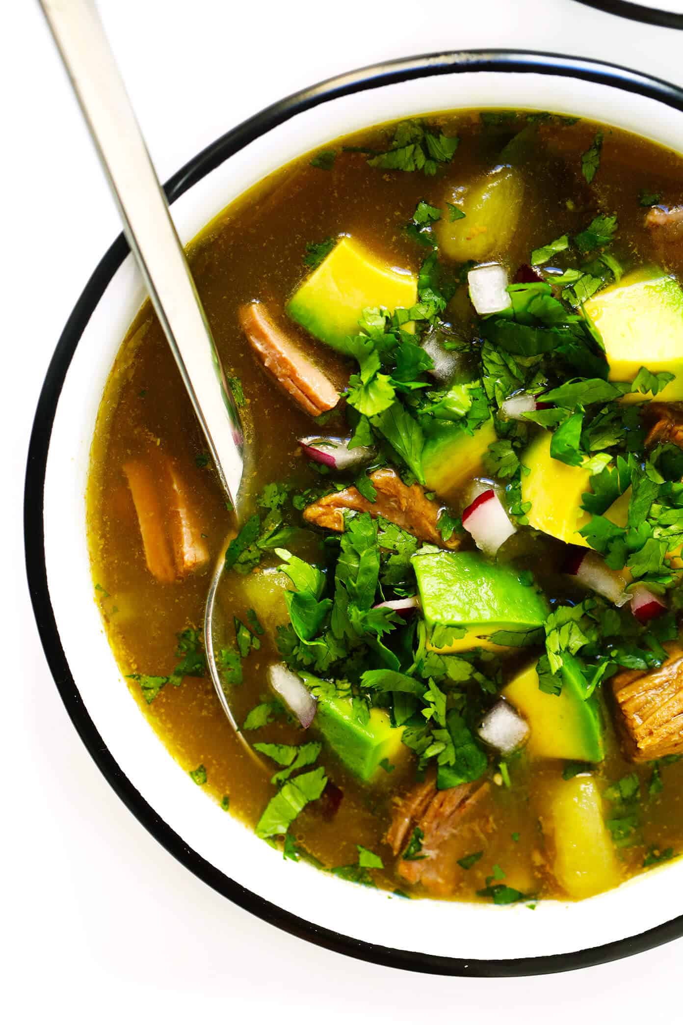 LOVE this Salsa Verde Steak Soup recipe!! It's easy to make in the Instant Pot, Crock-Pot or on the stovetop. It's full of tender beef, potatoes, poblano, and loaded up with lots of favorite toppings. And it is so cozy and delicious. | Gimme Some Oven #soup #mexican #beef #avocado #glutenfree #stew #instantpot #pressurecooker #slowcooker #crockpot #dinner Salsa Verde Steak Soup Recipe