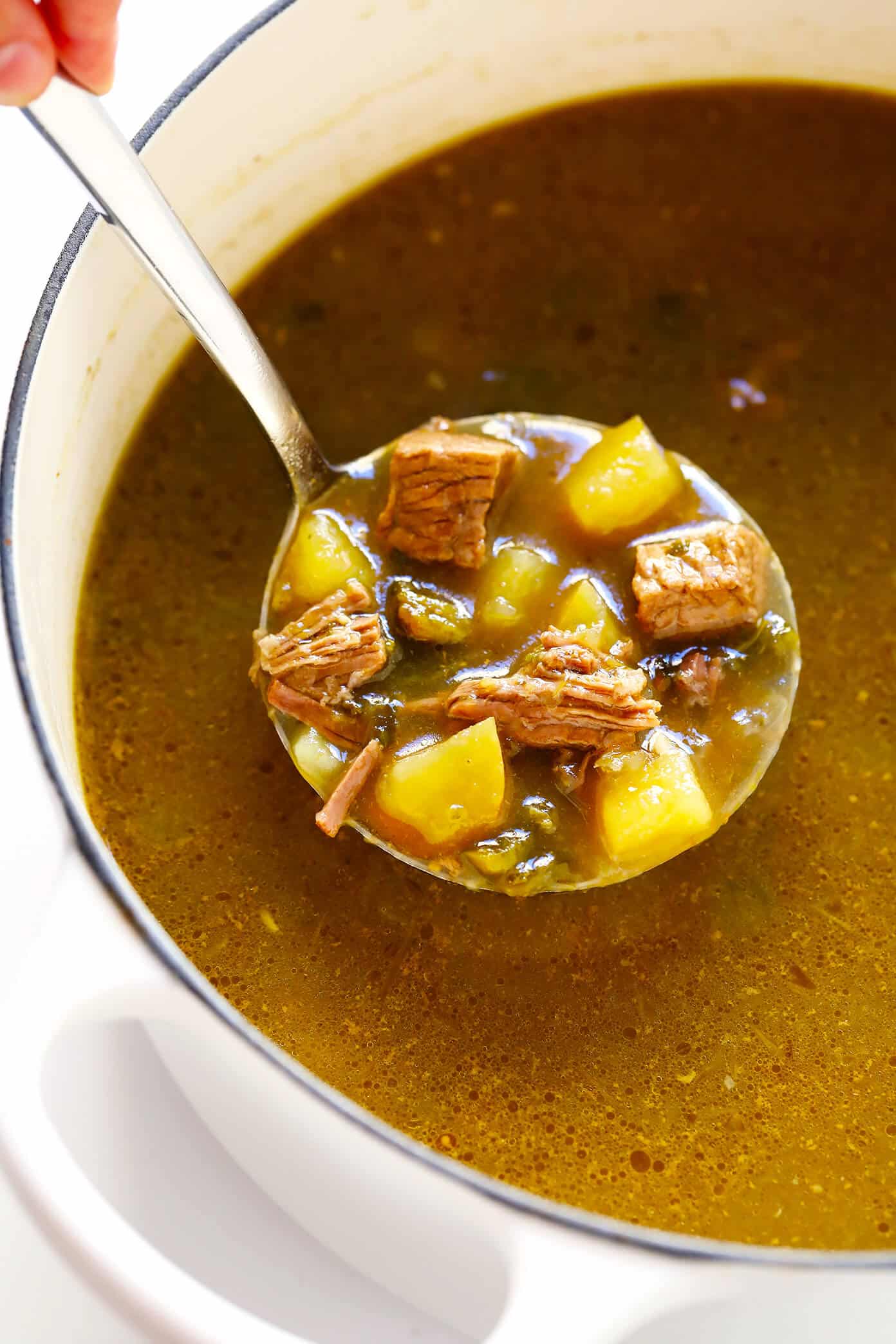LOVE this Salsa Verde Steak Soup recipe!! It's easy to make in the Instant Pot, Crock-Pot or on the stovetop. It's full of tender beef, potatoes, poblano, and loaded up with lots of favorite toppings. And it is so cozy and delicious. | Gimme Some Oven #soup #mexican #beef #avocado #glutenfree #stew #instantpot #pressurecooker #slowcooker #crockpot #dinner Salsa Verde Beef Stew
