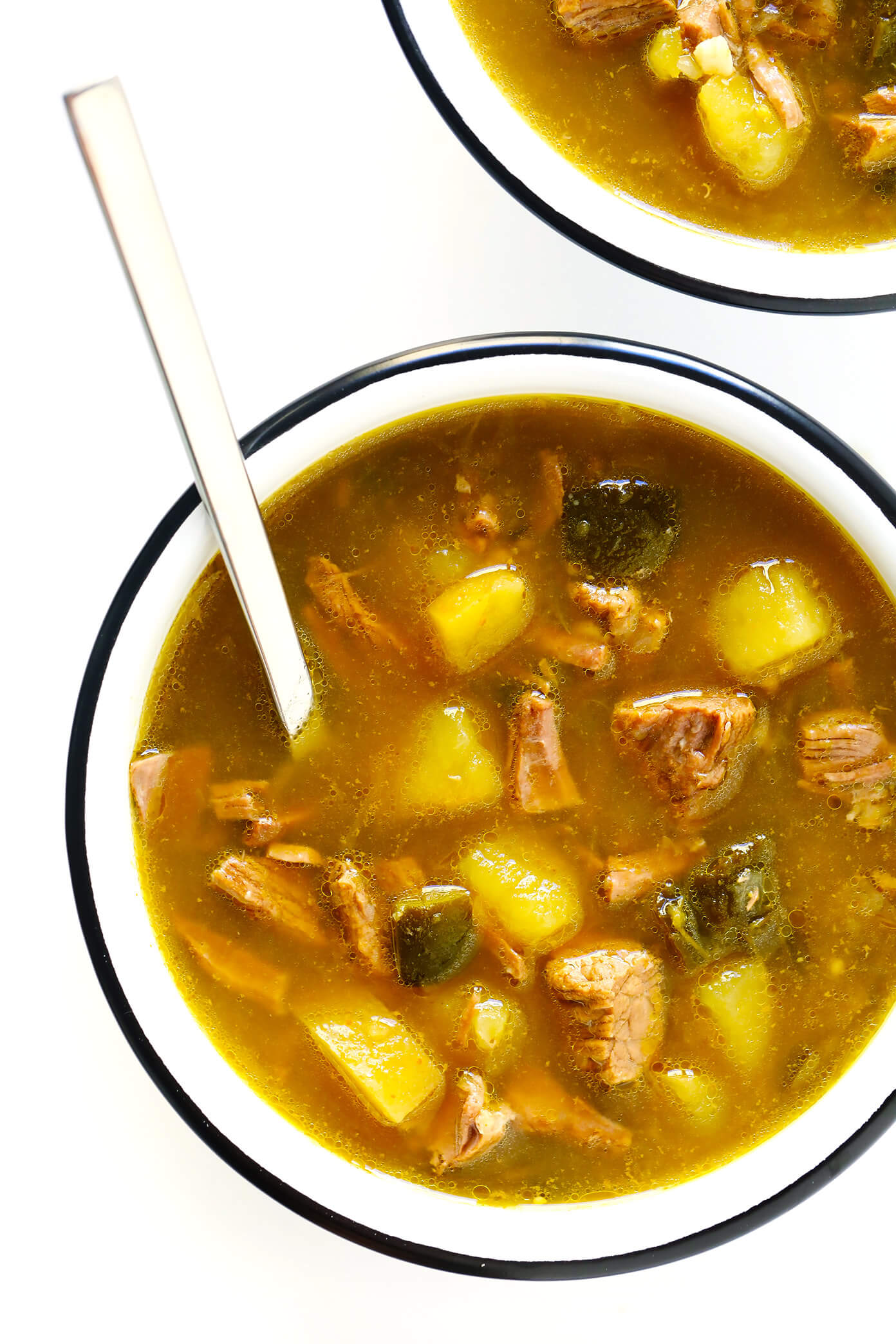 LOVE this Salsa Verde Steak Soup recipe!! It's easy to make in the Instant Pot, Crock-Pot or on the stovetop. It's full of tender beef, potatoes, poblano, and loaded up with lots of favorite toppings. And it is so cozy and delicious. | Gimme Some Oven #soup #mexican #beef #avocado #glutenfree #stew #instantpot #pressurecooker #slowcooker #crockpot #dinner Salsa Verde Steak Soup with Potatoes and Poblano