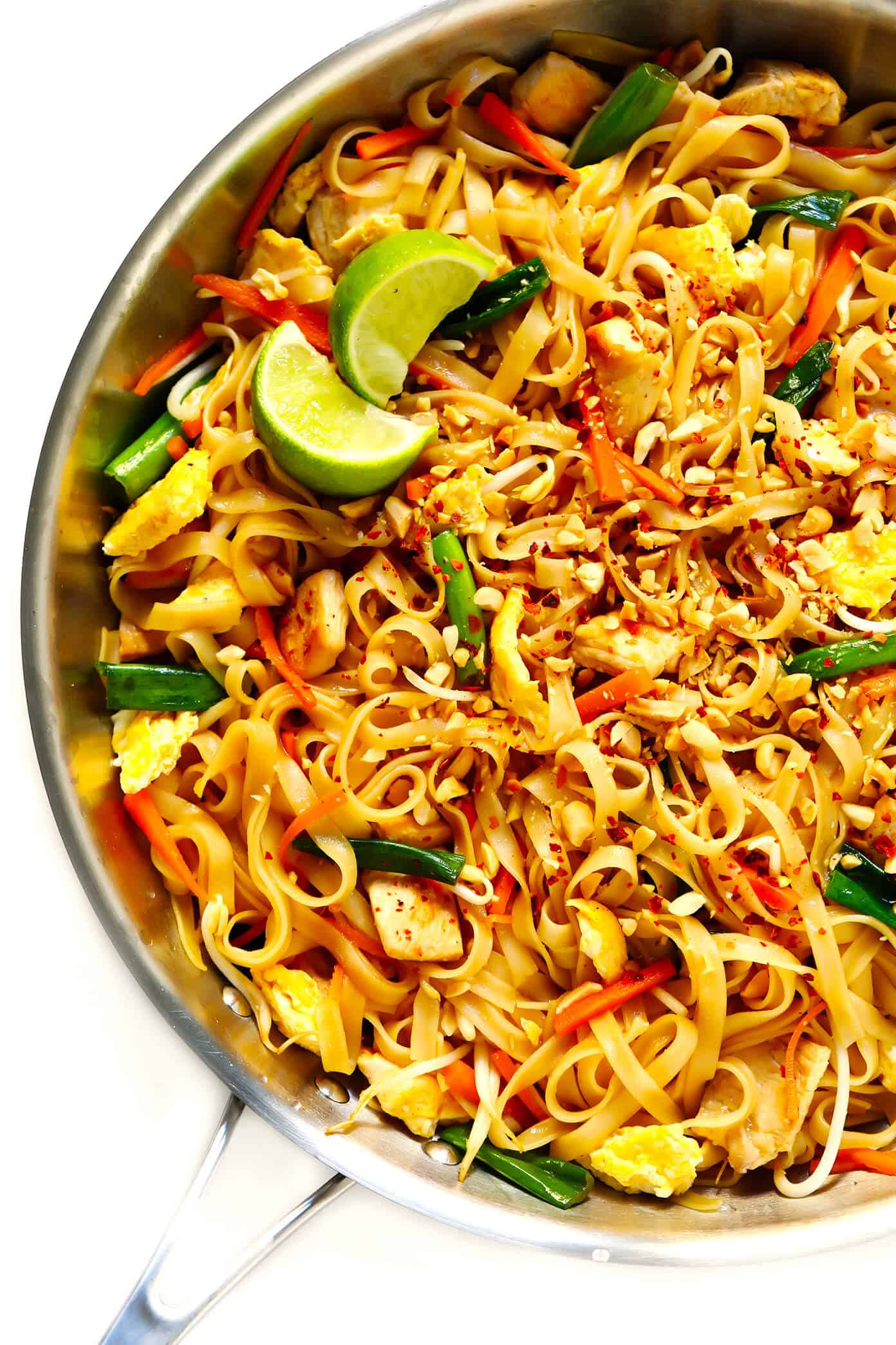 The BEST Pad Thai recipe! It's easy to make with either chicken, beef, pork, shrimp or vegetarian (with or without tofu), and tastes even better than the restaurant version! A delicious healthy dinner recipe that everyone will love. | gimmesomeoven.com #padthai #thai #noodles #stirfry #takeout #chicken #healthy #dinner #recipe #vegetarian Pad Thai Recipe