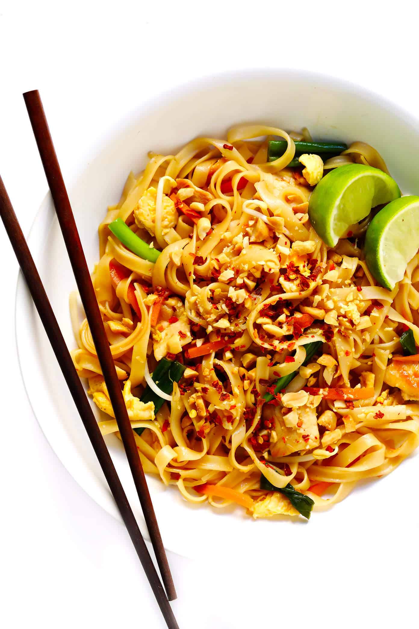 The BEST Pad Thai recipe! It's easy to make with either chicken, beef, pork, shrimp or vegetarian (with or without tofu), and tastes even better than the restaurant version! A delicious healthy dinner recipe that everyone will love. | gimmesomeoven.com #padthai #thai #noodles #stirfry #takeout #chicken #healthy #dinner #recipe #vegetarian Chicken Pad Thai Recipe