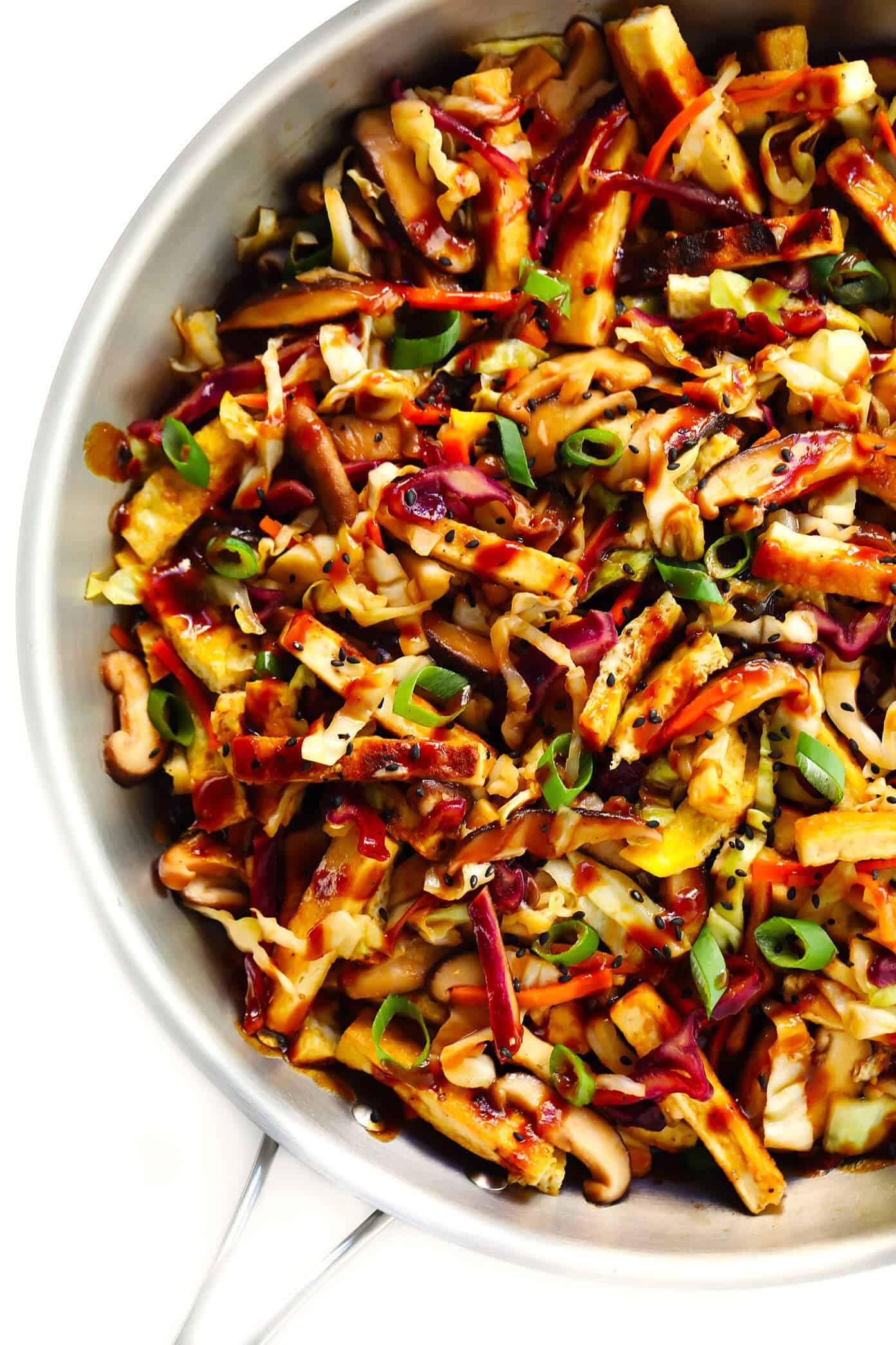LOVE this Vegetarian Moo Shu recipe! It's made with a healthy veggie stir-fry, crispy tofu, eggs, and the most delicious hoisin sesame sauce. Feel free to serve wrapped in tortillas to make "tacos", or over rice, quinoa or salad greens. One of my favorite #vegetarian #dinner recipes! | gimmesomeoven.com #mooshu #chinese #stirfry #tacos #takeout #vegetarian #healthy #sauce Vegetarian Moo Shu with Crispy Tofu