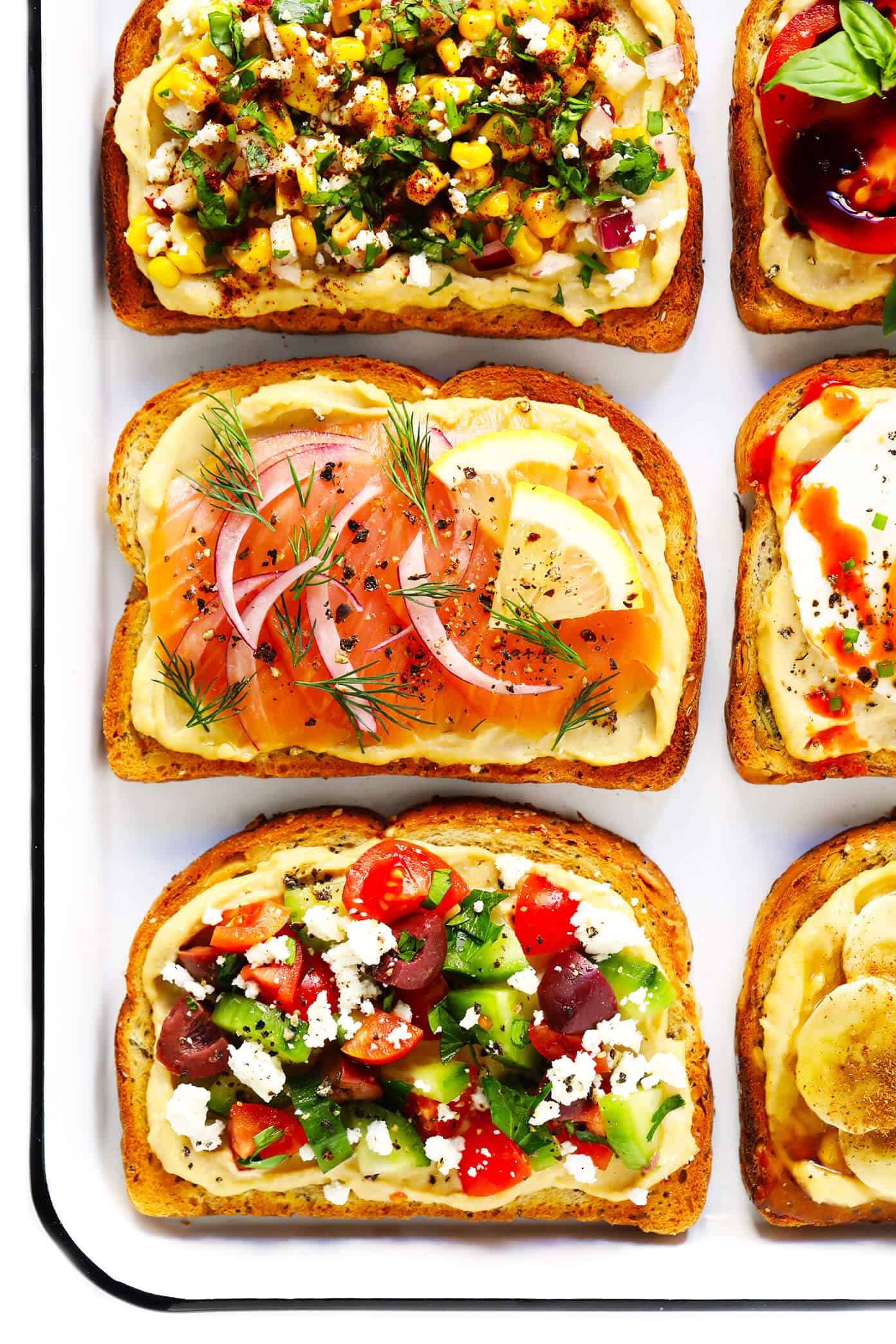 Hummus Toast is easy to make as a quick breakfast, lunch, dinner or healthy snack. It's totally customizable with your favorite toppings. And as you can imagine, it's also crazy delicious. Hummus Toasts