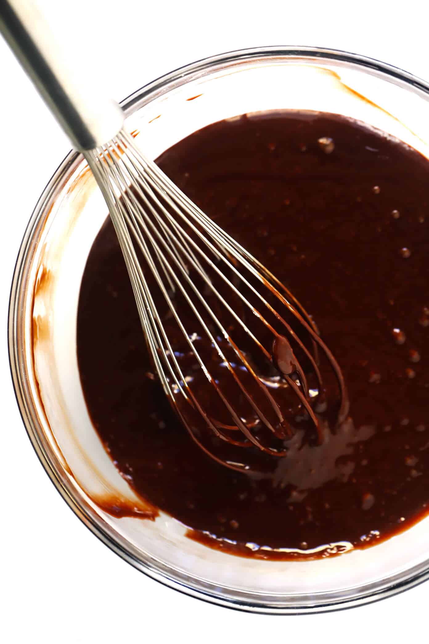This Dreamy Chocolate Lava Cakes recipe is the BEST! They're quick and easy to make in 20 minutes with just 7 ingredients. And that moist cake with its gooey, molten center is just as rich and decadent and chocolatey as ever. | gimmesomeoven.com #dessert #chocolate #cake #easy #pudding #party #valentines How To Make A Chocolate Lava Cake