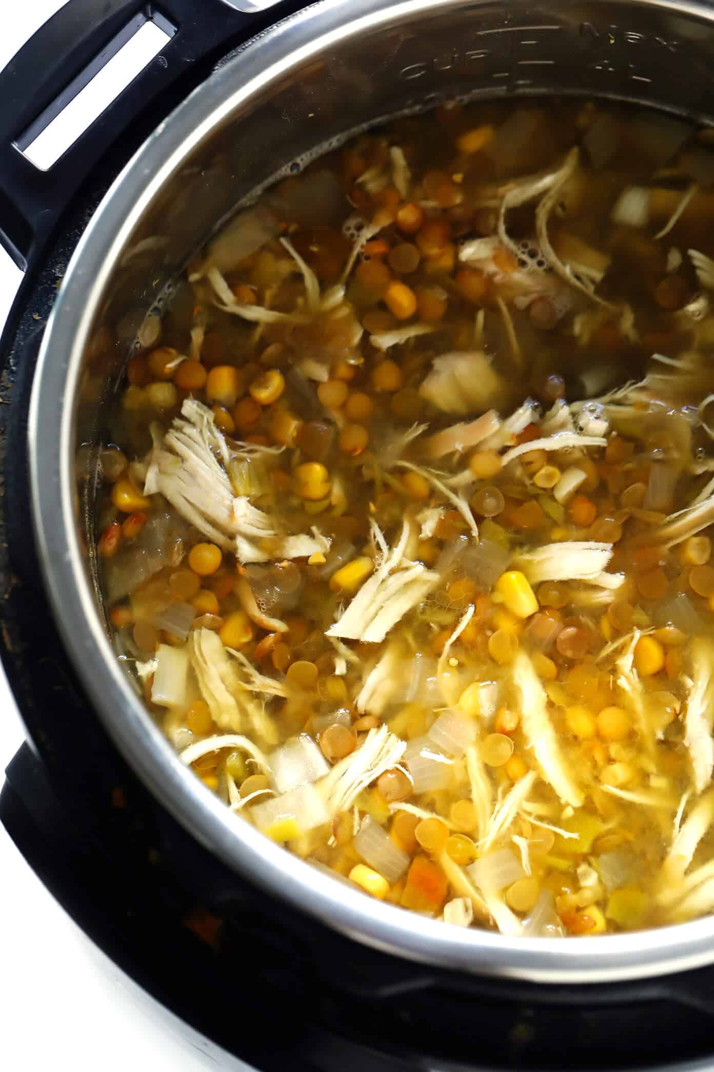 This Mexican Chicken Lentil Soup recipe is made with the most delicious zesty flavors, it's a great meal prep or freezer meal, and it's easy to make in either the Instant Pot, Crock-Pot or on the stovetop. | gimmesomeoven.com #chicken #lentil #soup #mexican #chili #glutenfree #mealprep #freezermeals #dinner #healthy Instant Pot Chicken Soup with Salsa Verde