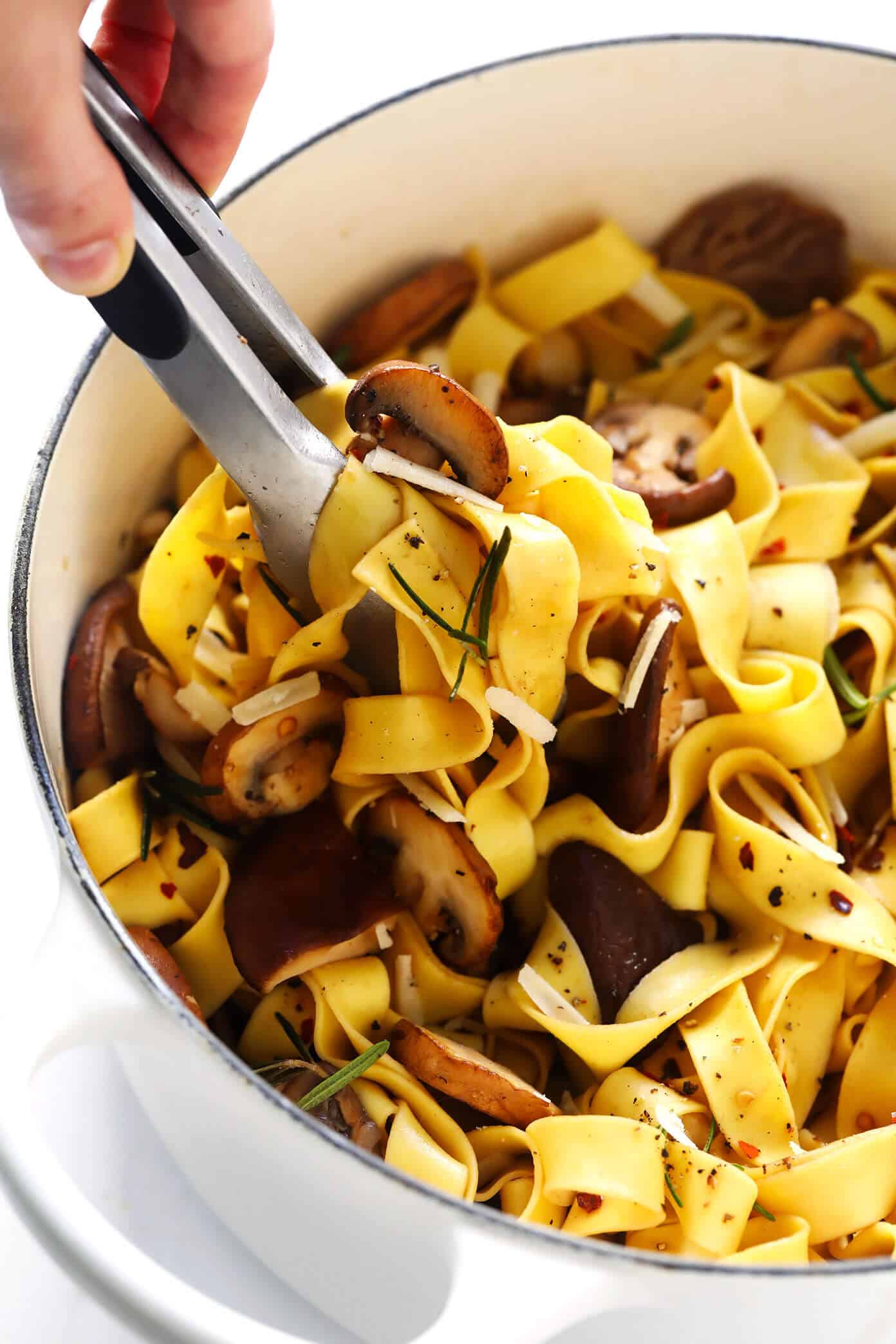 This Mushroom Lovers Pasta recipe is tossed with a heavenly rosemary balsamic butter sauce, lots of Parmesan cheese, pine nuts, and whatever kinds of mushrooms you love. Total (vegetarian!) comfort food. | gimmesomeoven.com #pasta #mushroom #vegetarian #dinner #valentines #cheese #sauce #italian Mushroom Lovers Pasta