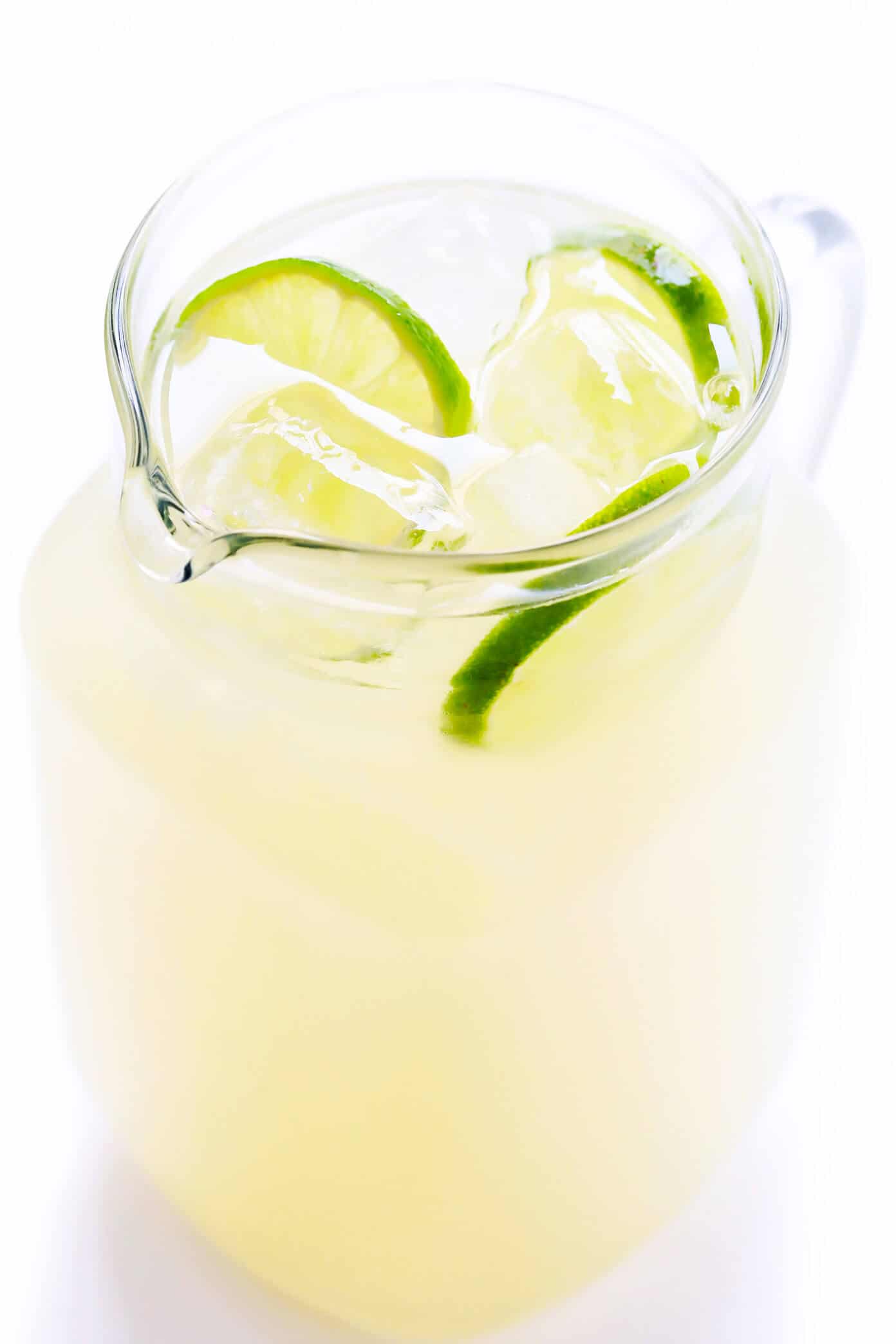 Learn how to make a margarita with this classic 3-ingredient margarita recipe! Instructions included for how to make a single-serving margarita cocktail or pitcher margaritas for a crowd. Plus options to make your drink smoky (with mezcal in place of tequila), spicy (with jalapeños or Tajín) or "skinny" (with fresh orange juice). | gimmesomeoven.com Pitcher Margaritas