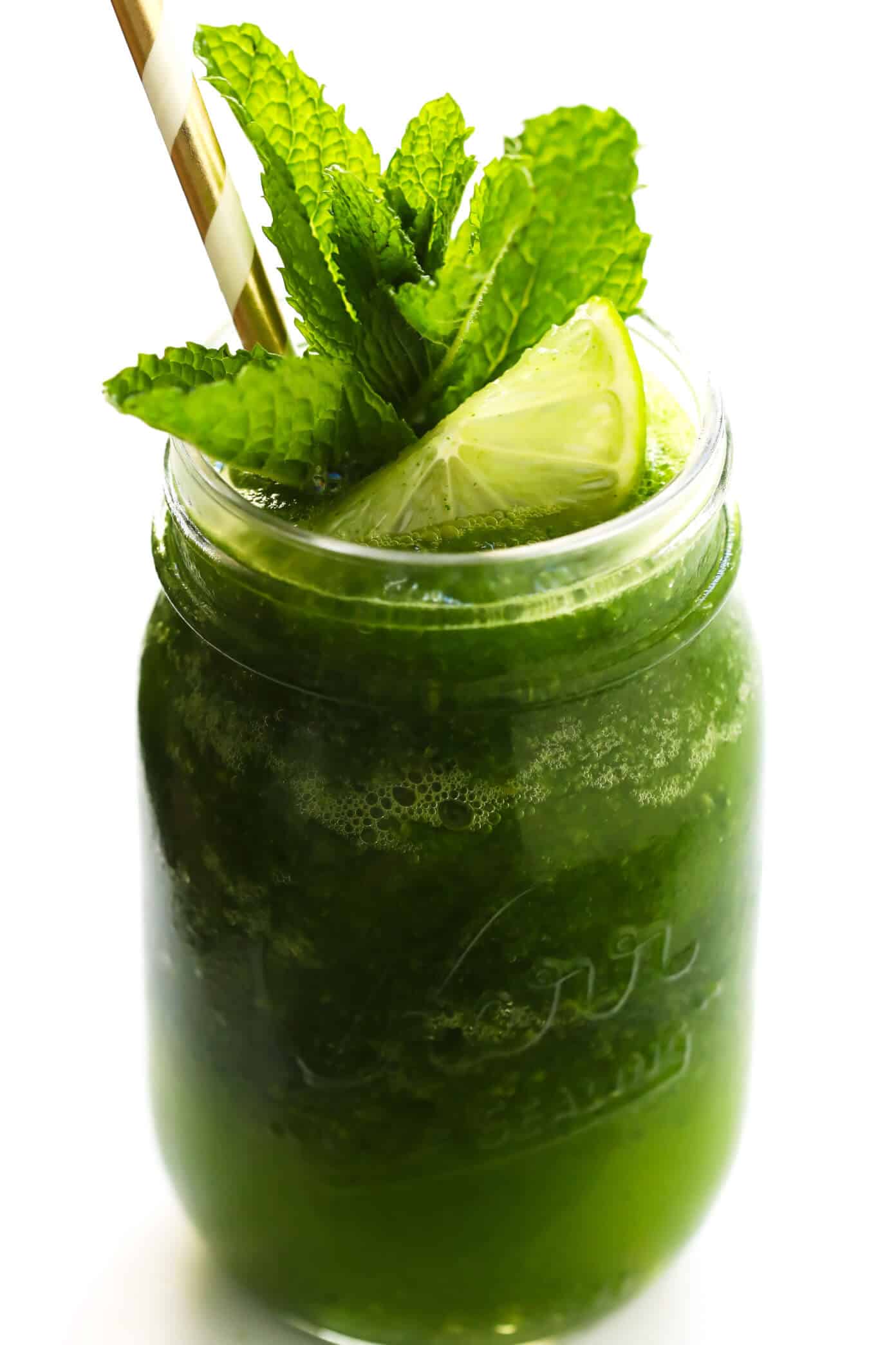 LOVE this frozen mojito recipe! (Frojitos!!) This summer cocktail recipe is easy to make in just 5 minutes with fresh mint, lime juice, rum, honey simple syrup and ice. Instructions included for how to make a single batch, or a pitcher for a crowd! | gimmesomeoven.com #mojito #cocktail #frozen #slushie #mint #drinks #lime Frozen Mojito Recipe (Frojitos)