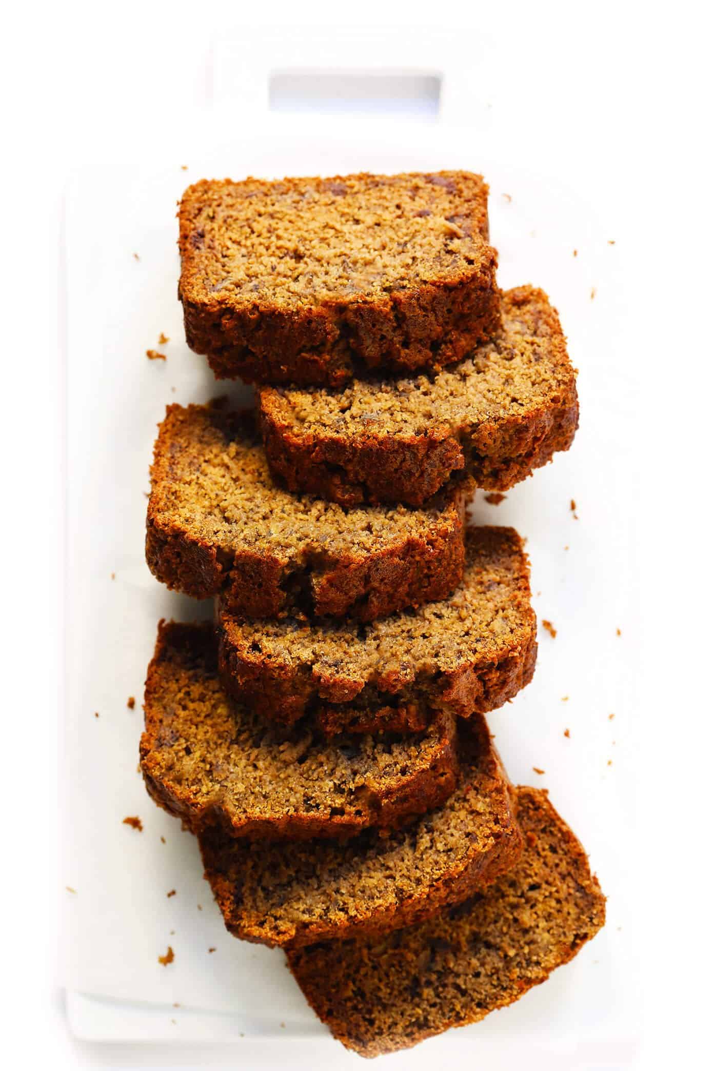 The BEST healthy banana bread recipe! It's easy to make, naturally gluten-free (made with oat flour) and dairy-free (coconut oil instead of butter), and full of the BEST banana flavors! Enjoy while it's nice and warm, or freeze the leftovers for later. | gimmesomeoven.com #banana #bread #healthy #breakfast #brunch #dessert #glutenfree #vegetarian #sweet Healthy Banana Bread