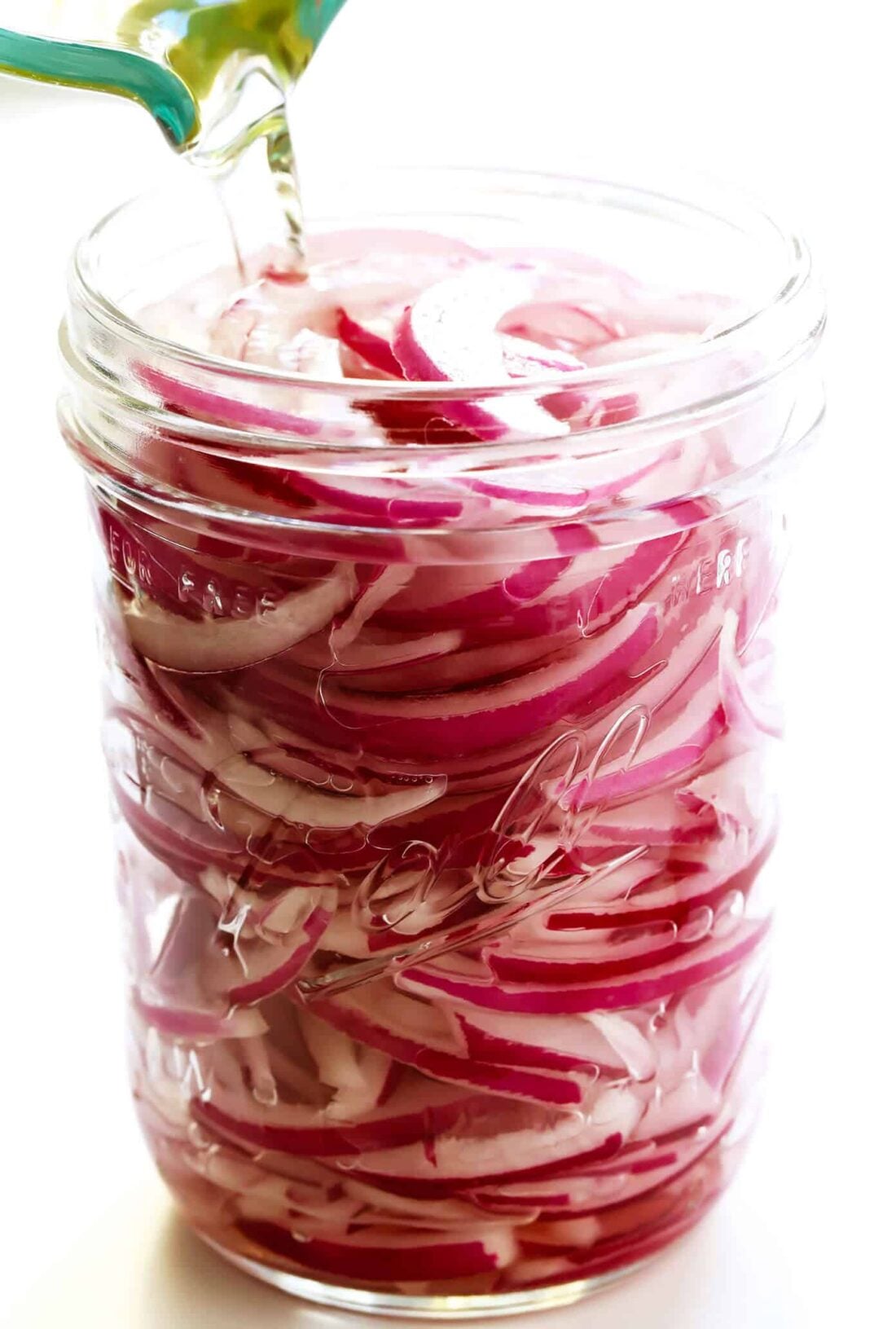 30-Minute Quick Pickled Red Onions! Easy to make with just 4 main ingredients, and totally customizable with whatever other herbs and seasonings that you would like to add. And delicious with everything from tacos to curry, pizza, falafel and more! | gimmesomeoven.com #pickled #onions #topping #mexican #healthy How To Make Pickled Onions