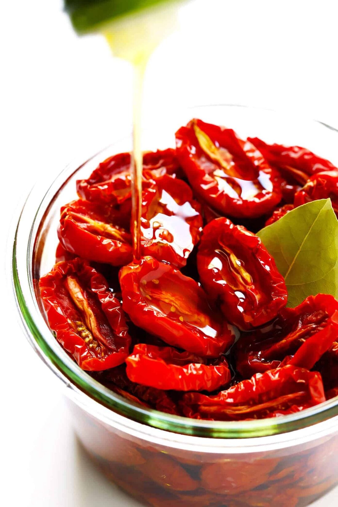Learn how to make sun-dried tomatoes in the oven! This recipe can be easily customized to be as spicy, garlicky, herby or plain as you prefer. | gimmesomeoven.com #sundriedtomatoes #tomatoes #summer #topping #italian #healthy #vegan #glutenfree Homemade Sun-Dried Tomatoes