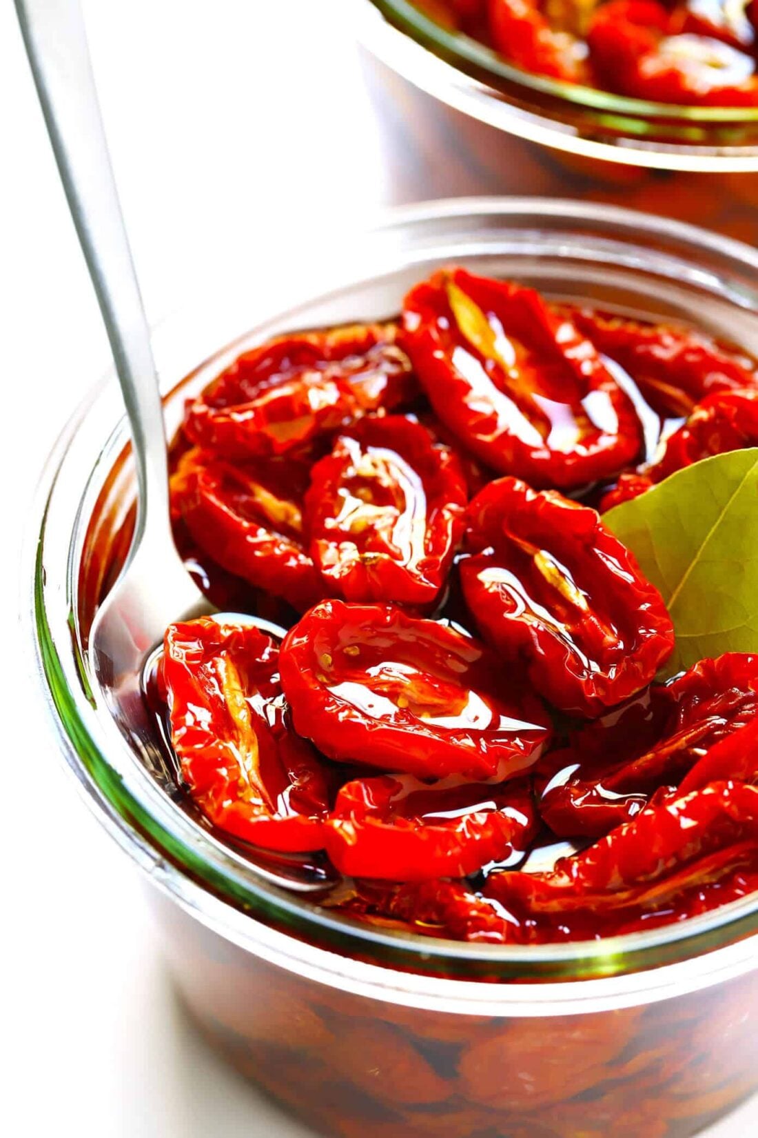 Learn how to make sun-dried tomatoes in the oven! This recipe can be easily customized to be as spicy, garlicky, herby or plain as you prefer. | gimmesomeoven.com #sundriedtomatoes #tomatoes #summer #topping #italian #healthy #vegan #glutenfree Oven Sun-Dried Tomatoes