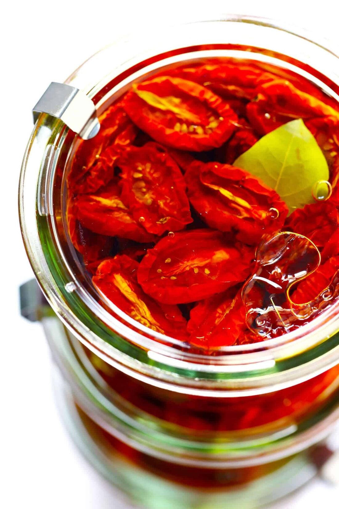 Learn how to make sun-dried tomatoes in the oven! This recipe can be easily customized to be as spicy, garlicky, herby or plain as you prefer. | gimmesomeoven.com #sundriedtomatoes #tomatoes #summer #topping #italian #healthy #vegan #glutenfree Sun-Dried Tomatoes in Weck Jars