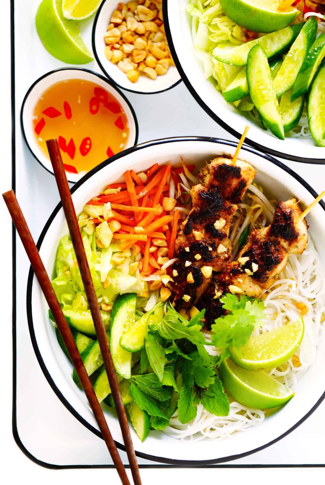 This Vietnamese Noodle Bowls recipe is easy to make with chicken (or beef, pork, shrimp, tofu or meatballs), rice noodles, loads of fresh veggies, herbs, and nuoc cham (that Vietnamese dipping sauce that tastes good on everything!). Perfect for healthy dinners or meal prep! | gimmesomeoven.com #vietnamese #noodles #chicken #mealprep #healthy #asian #salad Vietnamese Bun Recipe (Chicken Noodle Bowls with Nuoc Cham)