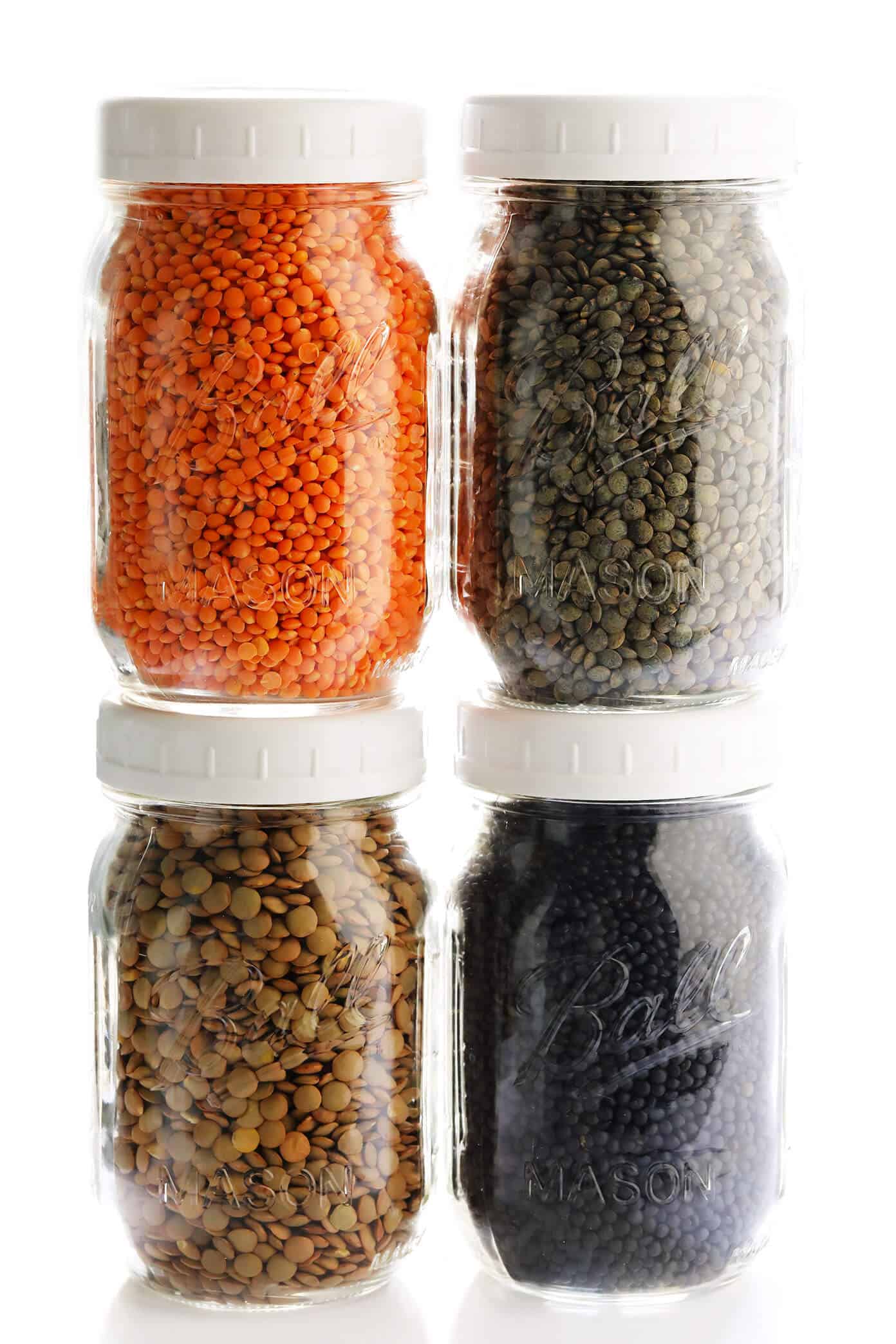 A complete tutorial for how to cook lentils (French, green, brown, black and red lentils). Plus tips for how to season and store lentils for meal prep, and lots of my favorite healthy lentil recipes! | gimmesomeoven.com #lentils #beans #healthy #glutenfree #vegetarian #vegan #mealprep #side #dinner Different Types Of Lentils (Red Lentils, French Lentils, Brown Lentils, Black Lentils)