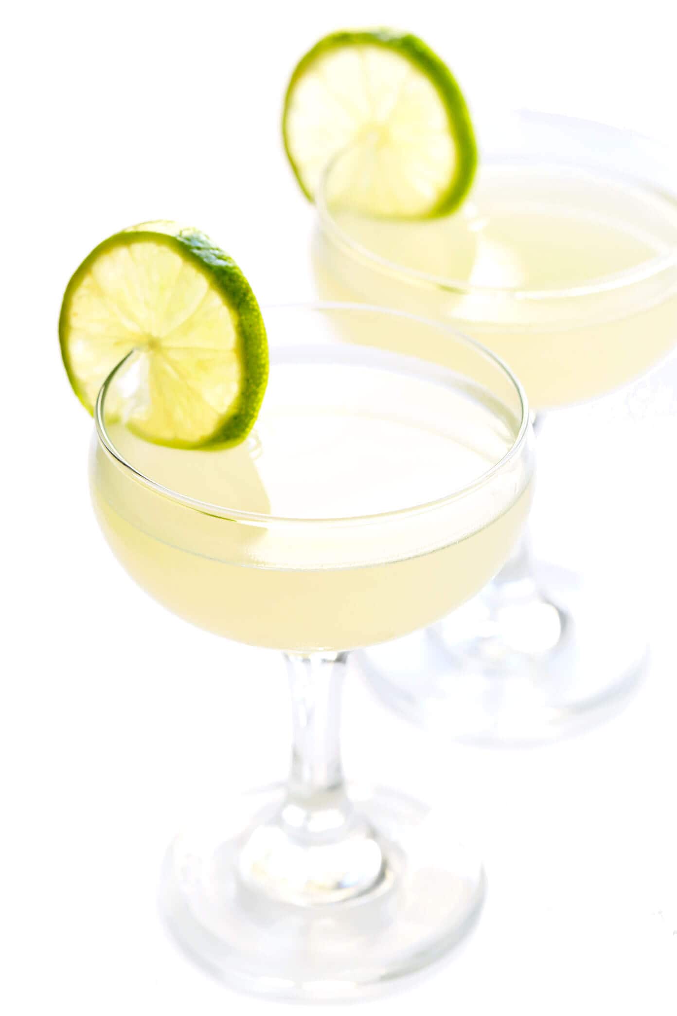 Learn how to make a classic gimlet cocktail with 3 ingredients -- gin, lime juice and simple syrup (either traditional or honey simple syrup). It's a refreshing summer cocktail that's easy to whip up in just a few minutes! | gimmesomeoven.com #gimlet #cocktail #drink #gin #vodka #lime Gimlet Recipe