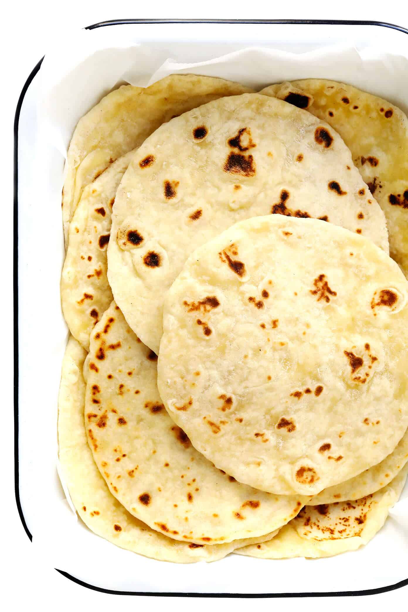My favorite homemade flour tortillas are irresistibly soft, chewy, thick, and flavorful -- and easy to make with just 5 ingredients (no lard)! Perfect for tacos, burritos, enchiladas, quesadillas, and naturally vegan too! | gimmesomeoven.com #flour #tortillas #mexican #texmex #easy #tacos #enchiladas #burrito #homemade #diy #mealprep Homemade Flour Tortillas