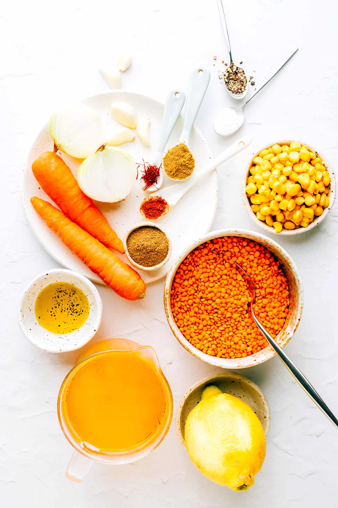 This Lemony Lentil Soup recipe is full of hearty red lentils and veggies, zesty seasonings, and a bright squeeze of lemon. Naturally gluten-free, vegetarian and vegan, easy to make in the Instant Pot, Crock-Pot or on the stovetop, and always so delicious. Such a great healthy and easy dinner recipe! | gimmesomeoven.com Lentil Soup Ingredients