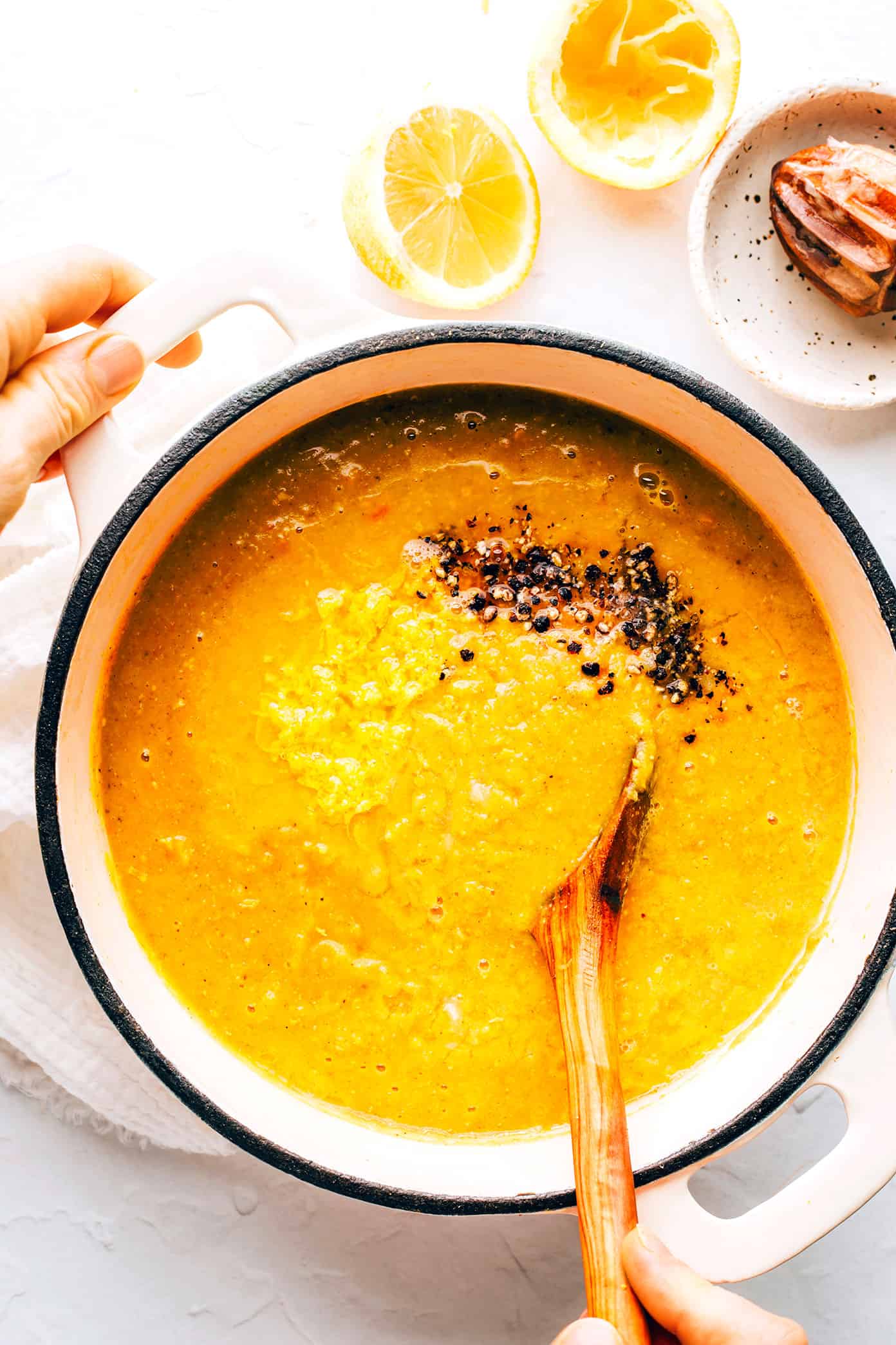 This Lemony Lentil Soup recipe is full of hearty red lentils and veggies, zesty seasonings, and a bright squeeze of lemon. Naturally gluten-free, vegetarian and vegan, easy to make in the Instant Pot, Crock-Pot or on the stovetop, and always so delicious. Such a great healthy and easy dinner recipe! | gimmesomeoven.com Red lentil soup in pot