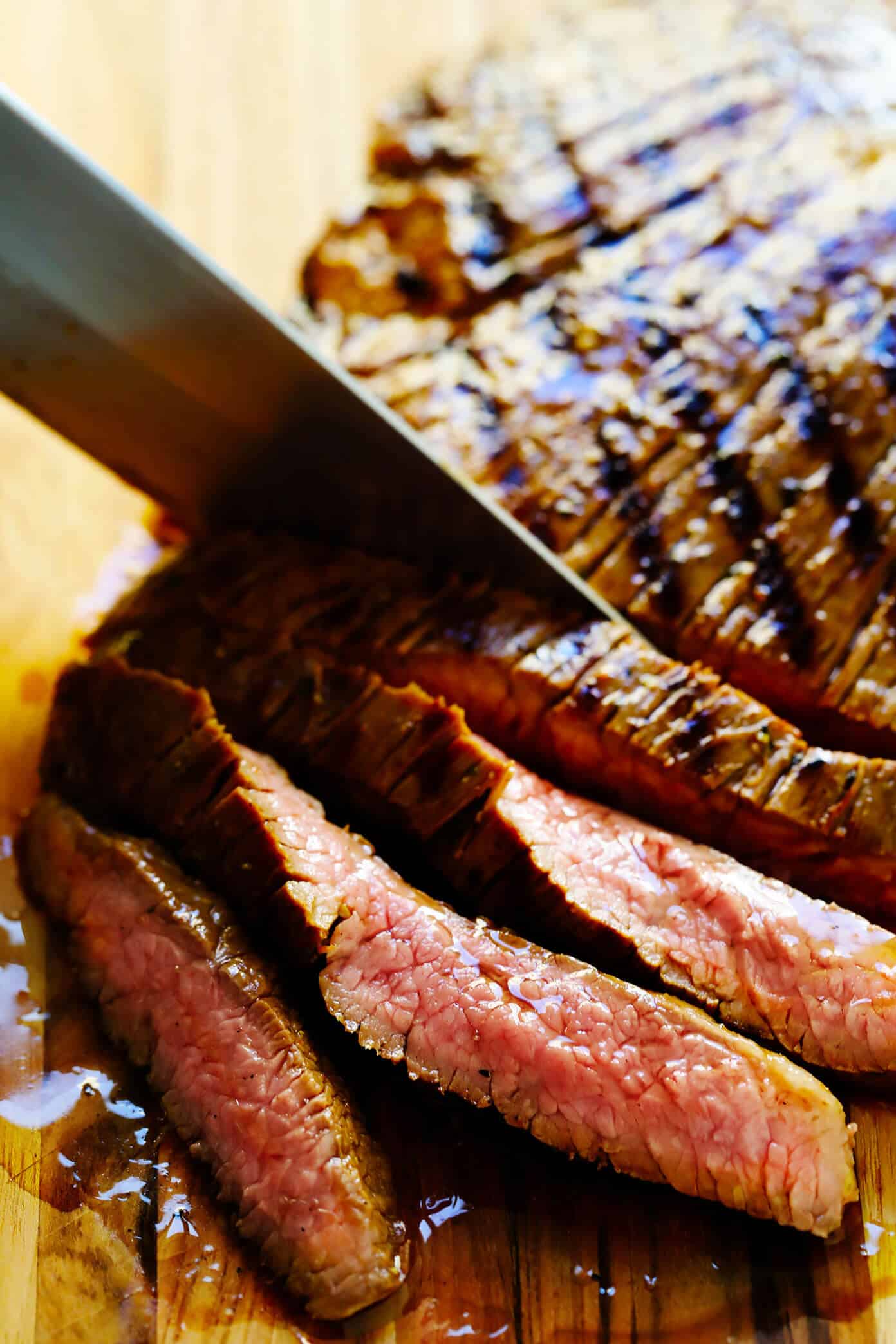 My favorite recipe for street-style Mexican carne asada tacos -- made with tender marinated grilled steak, soft corn tortillas, guacamole or sliced avocado, and whatever other toppings sound good! | gimmesomeoven.com #carneasada #beef #steak #tacos #mexican #avocado #guacamole #glutenfree #dinner Carne Asada