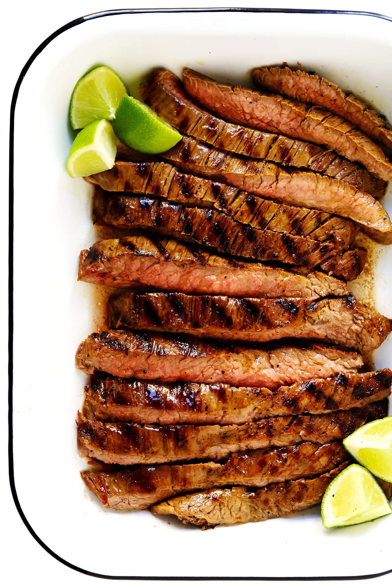 My favorite Mexican carne asada recipe -- made with a flavor-packed citrusy carne asada marinade, and easy to cook on an outdoor grill or on the stovetop. Serve this tender grilled steak in tacos, burritos, nachos, fries, or whatever sounds good! | gimmesomeoven.com #carneasada #steak #mexican #grilled #beef #marinade #glutenfree #tacos #fries #easy #summer Carne Asada