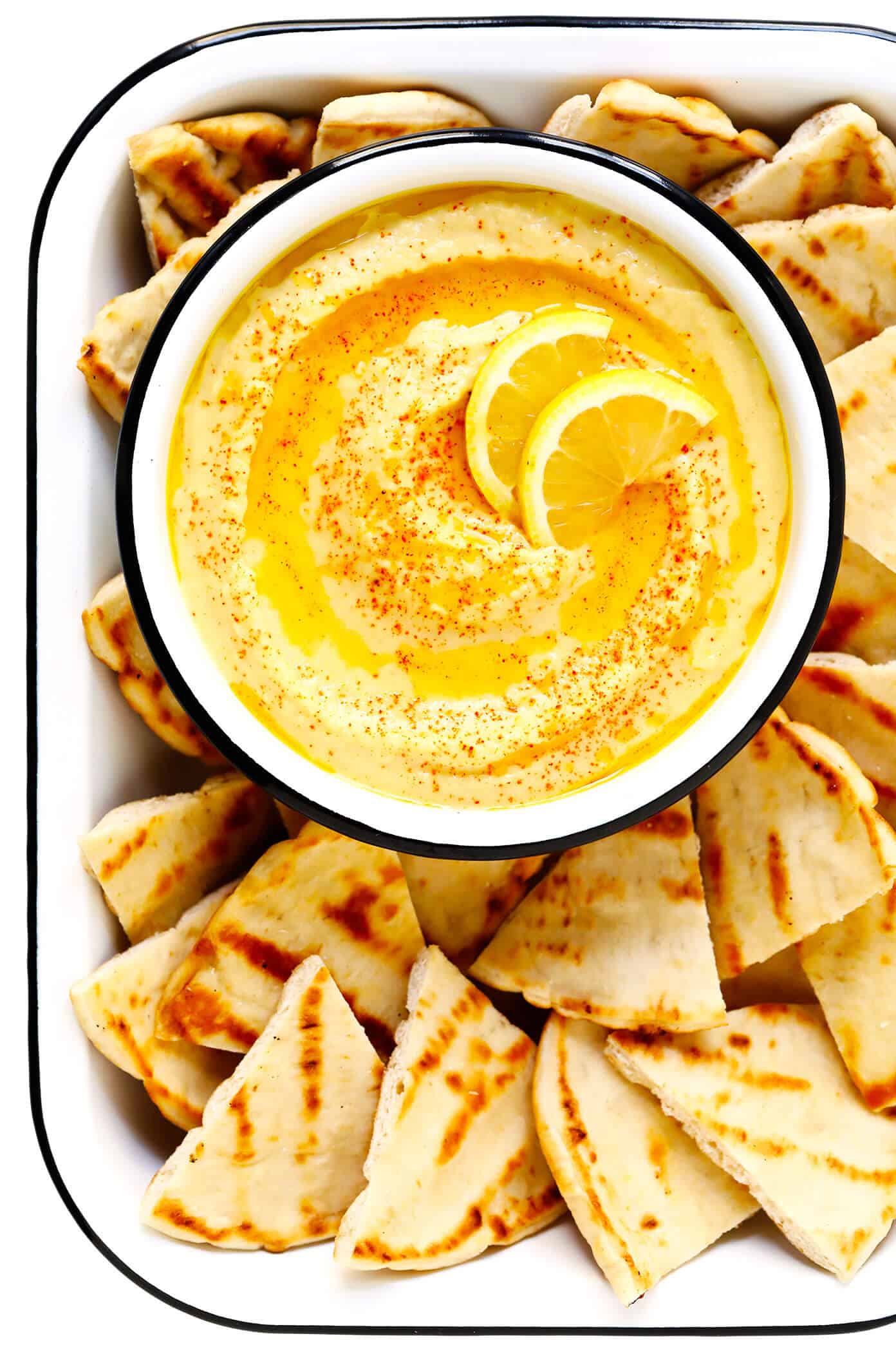 This Greek Fava (Yellow Split Pea Dip) recipe tastes refreshingly light, lemony and zesty, and is the perfect appetizer or side dish for serving with pita bread or any of your favorite dippers. | gimmesomeoven.com #greek #fava #santorini #splitpea #dip #spread #appetizer #healthy #vegan #glutenfree #vegetarian Greek Fava Dip with Pita Bread