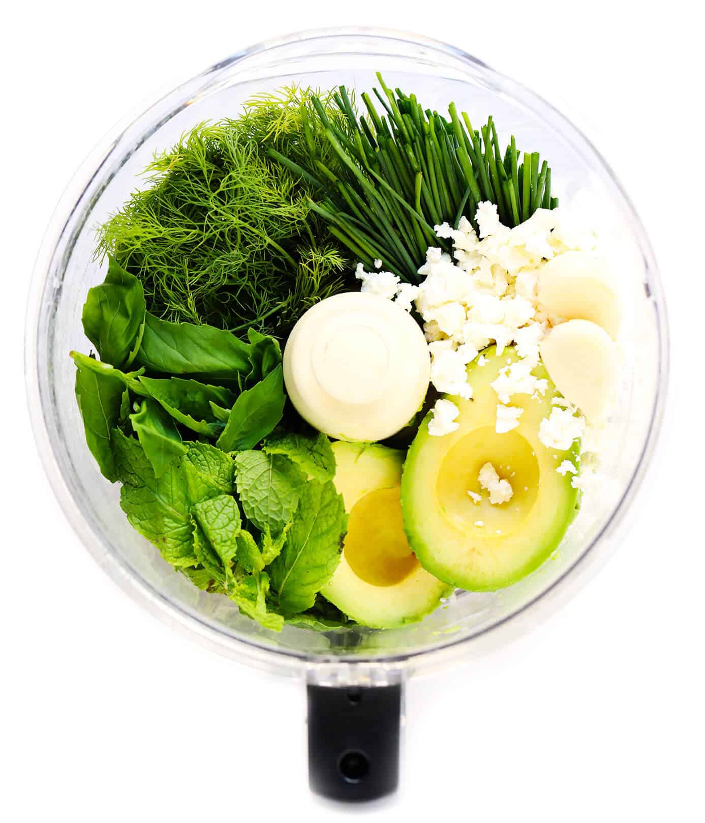 This Green Goddess Feta Dip recipe is packed with tons of fresh herbs (basil, mint, dill), creamy avocado, and lots of tangy lemon and feta. Serve it up with crusty bread, veggies, crackers or any of your favorite dippers! | gimmesomeoven.com #greengoddess #avocado #dip #spread #summer #feta #cheese #vegetarian #glutenfree #appetizer #mediterranean Green Goddess Dip Ingredients