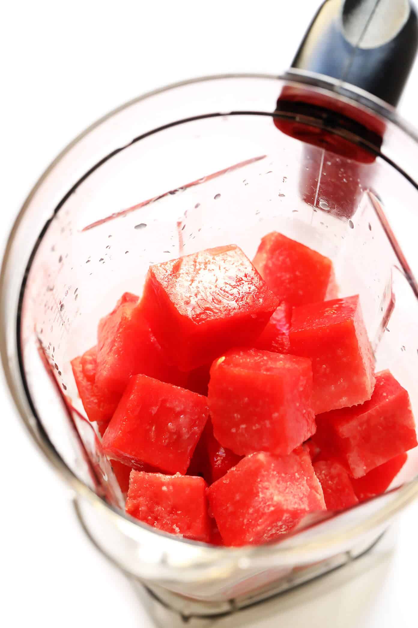 These Watermelon Lime Mocktail recipe is easy to make with just 2 ingredients and kicked up a notch with a fun Tajín rim. It's the perfect frozen slushy for summer! | gimmesomeoven.com #watermelon #mocktail #slushie #slushy #nonalcoholic #drink #frozen #summer Watermelon and Lime Juice In Blender