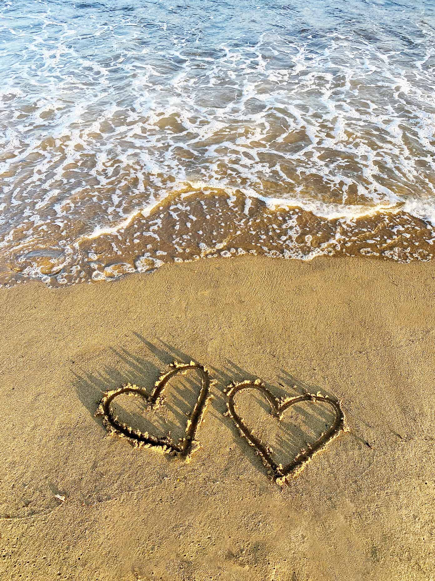Our Barcelona Bebé | Gimme Some Oven #pregnancy #infertilityjourney #ivf #spain Two hearts in the sand