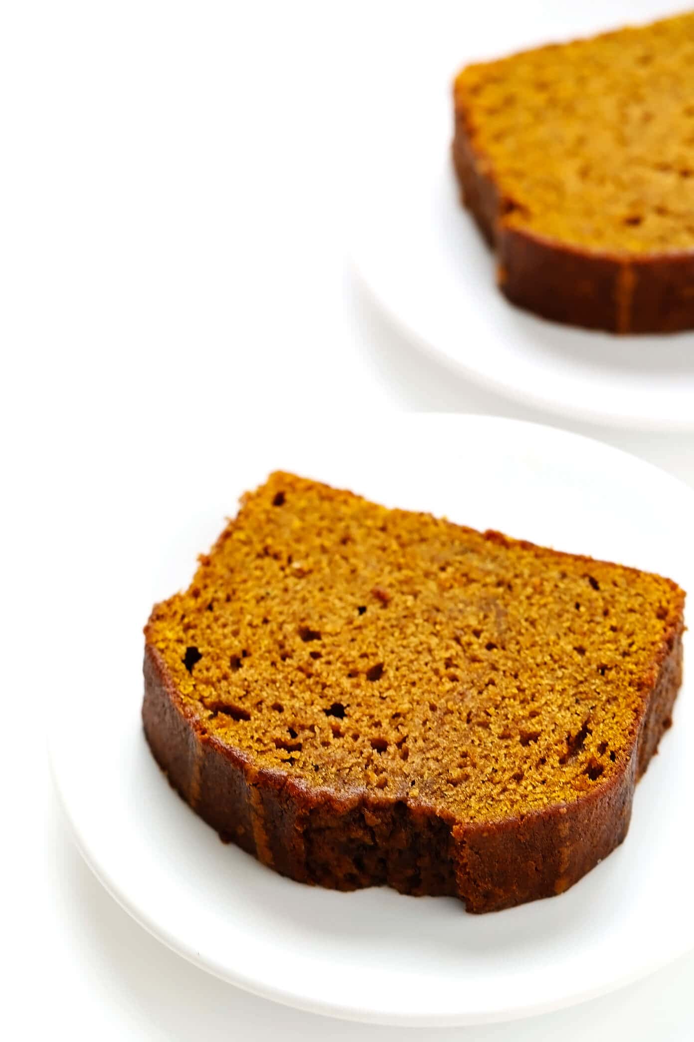 The BEST pumpkin bread recipe -- easy to make without a mixer, perfectly moist, and full of the best pumpkin spice flavors! | gimmesomeoven.com #pumpkin #bread #fall #autumn #baking #breakfast #brunch #easy #thanksgiving Individual Slices of Pumpkin Bread