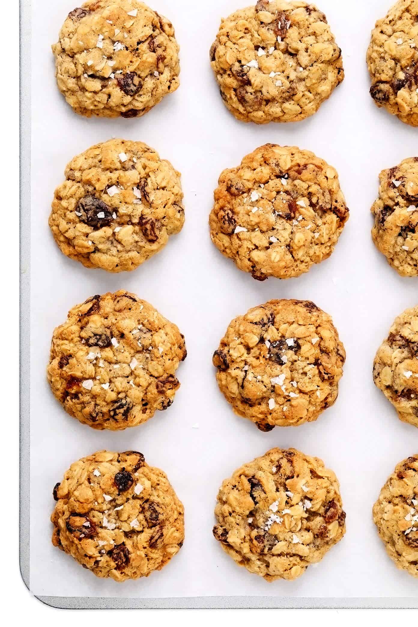 My favorite oatmeal cookies recipe that's perfectly soft and chewy, easy to make, and full of the best oatmeal cinnamon flavors. Feel free to add raisins, chocolate chips or nuts too if you would like! | gimmesomeoven.com #oatmeal #cookies #chocolatechip #raisin #dessert #christmas #baking #vegetarian Oatmeal Cookies on Sheet Pan
