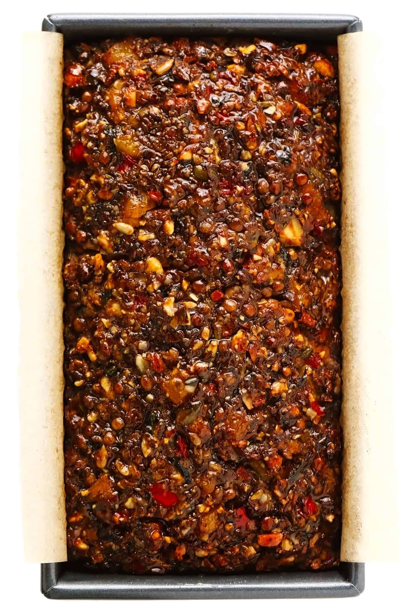 This Nut Roast recipe is packed with a deliciously sweet and savory blend of nuts, veggies, lentils, dried apricots and fresh rosemary and sage. It's easy to prep in advance, naturally gluten-free + vegetarian + vegan, and absolutely delicious served with cranberry sauce and/or gravy. Perfect for the holidays (especially Christmas, Thanksgiving or Easter) or Sunday dinner! | gimmesomeoven.com #nutroast #vegetarian #vegan #glutenfree #healthy #dinner #christmas #holiday Nut Roast in a Bread Pan