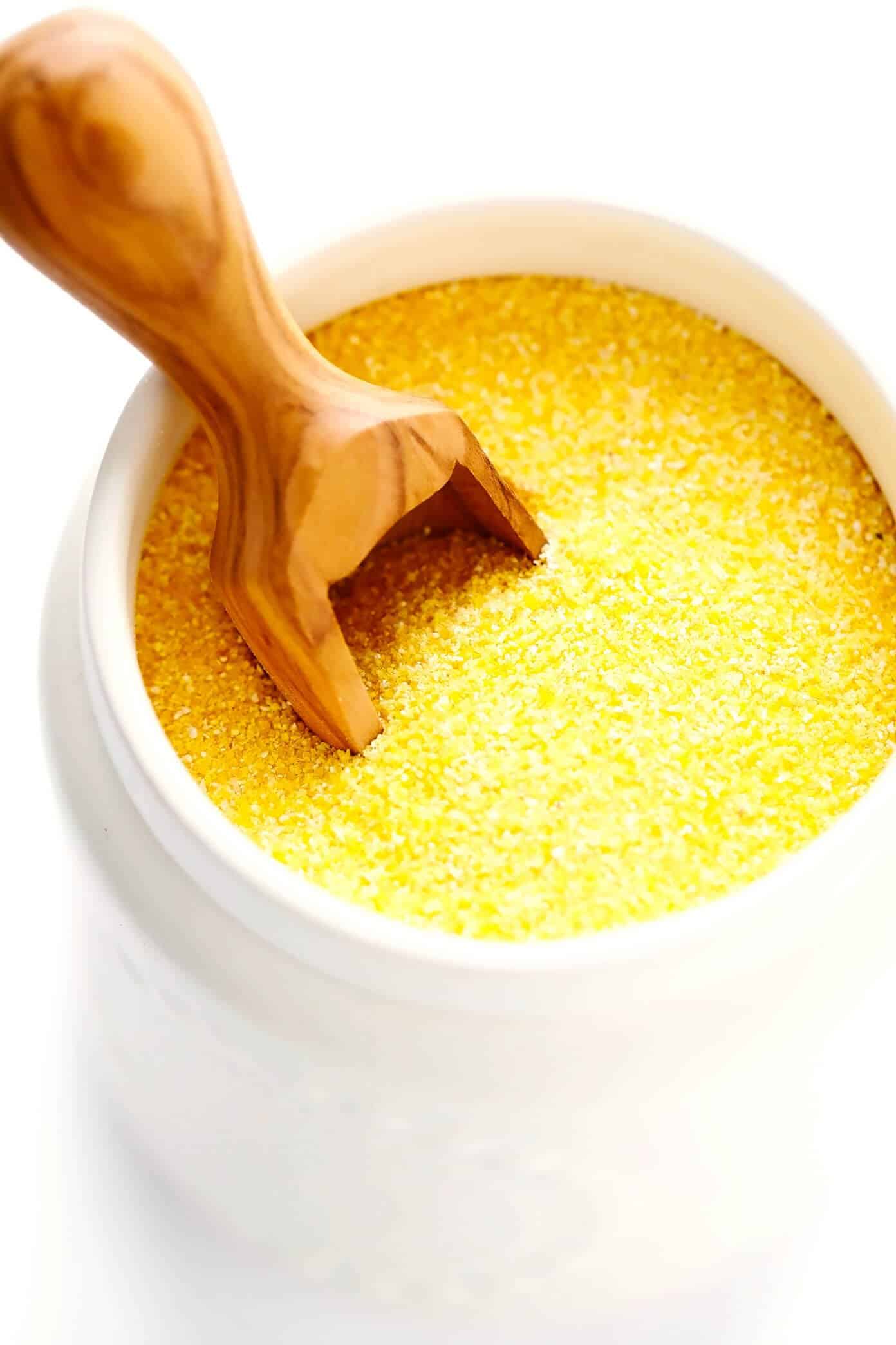 This amazing homemade cornbread recipe is lightly sweetened with honey, made extra moist with buttermilk, and tastes so buttery and delicious! Easy to make in a basic baking dish or cast iron skillet, or you can use this batter to make cornbread muffins. And perfect for serving with soup, chili, dressing/stuffing, or whatever sounds good! | gimmesomeoven.com #cornbread #bread #healthy #skillet #side #homemade #vegetarian #glutenfree Cornmeal