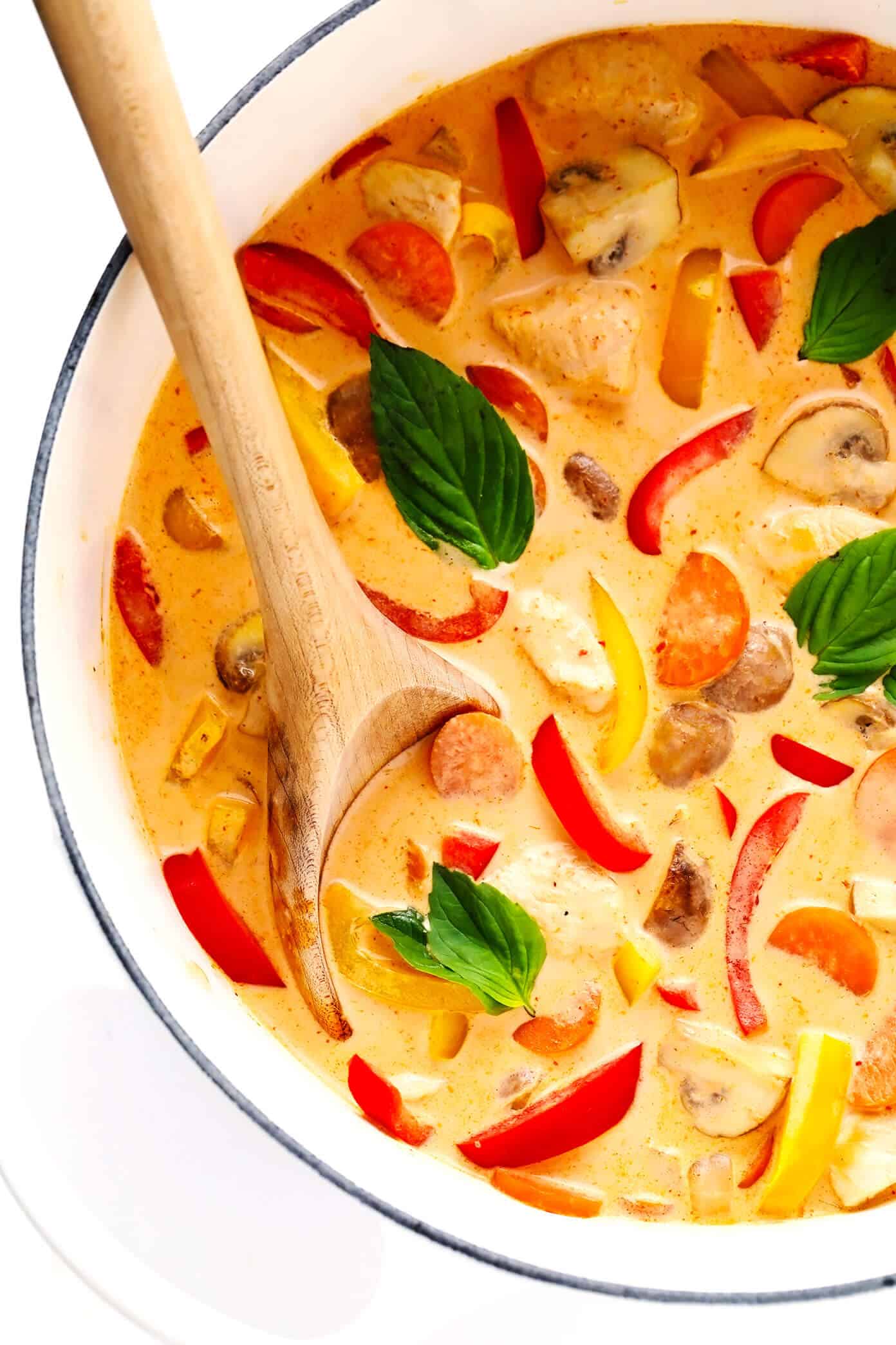 This cozy Thai Chicken Curry recipe is quick and easy to whip up in about 30 minutes, it's made with the yummiest Thai red coconut curry sauce, and it's easy to customize with your favorite veggies and proteins. Feel free to swap beef, pork, shrimp, tofu or vegetarian/vegan alternatives for the chicken and serve over rice, noodles, quinoa or on its own. | gimmesomeoven.com #thai #chicken #curry #stirfry #soup #asian #healthy #glutenfree #dinner #vegetable Thai Red Curry with Chicken in Stockpot