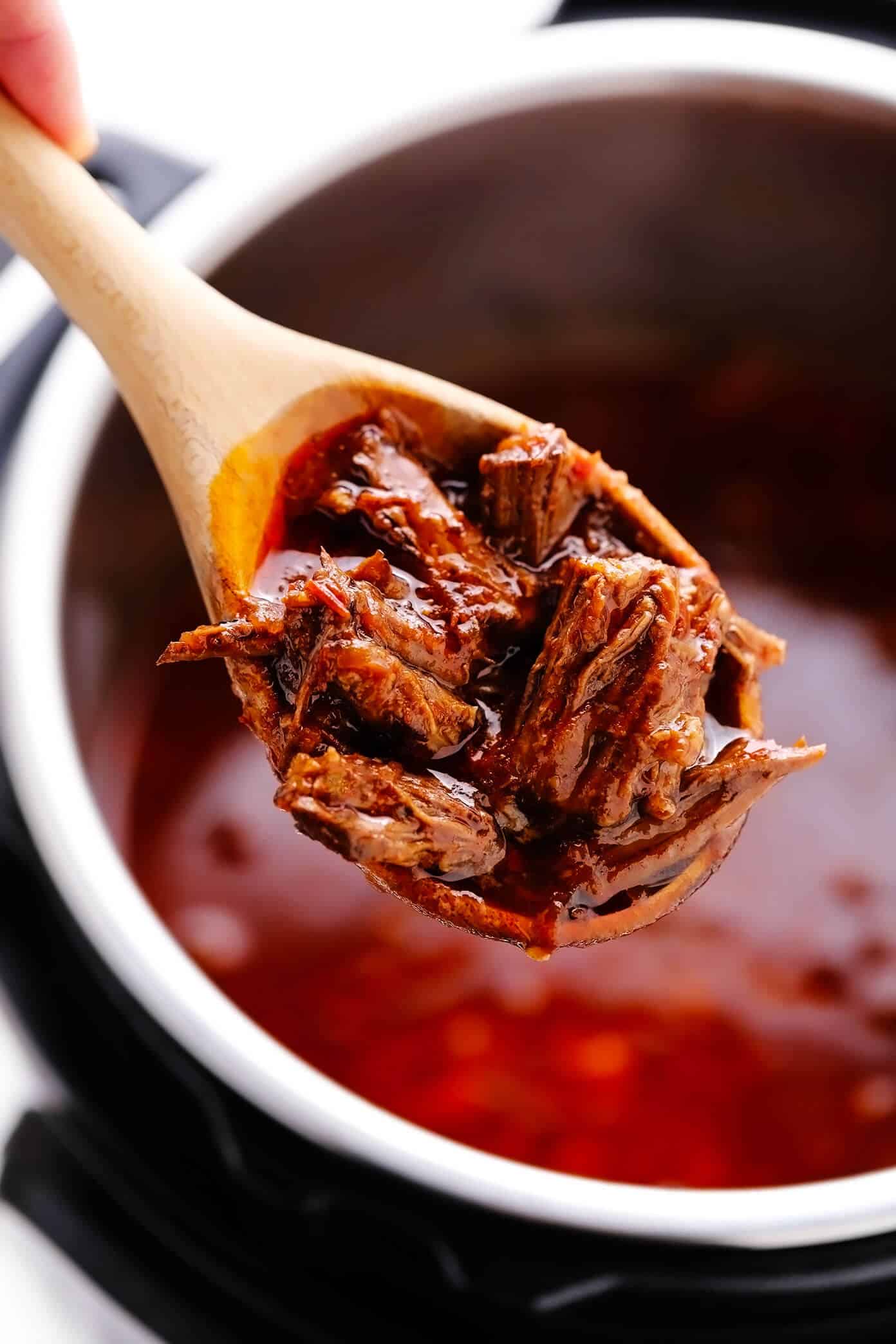 This delicious birria recipe (Mexican beef stew) is SO flavorful and comforting, and it's easy to make in Crock-Pot, Instant Pot or on the stovetop. Serve it as a simple stew or use this recipe to make birria tacos (or fried cheesy birria quesatacos) dipped in consomme! | gimmesomeoven.com #birria #stew #tacos #beef #crockpot #slowcooker #instantpot #pressurecooker #dinner #mexican Instant Pot Birria de Res (Beef Stew)